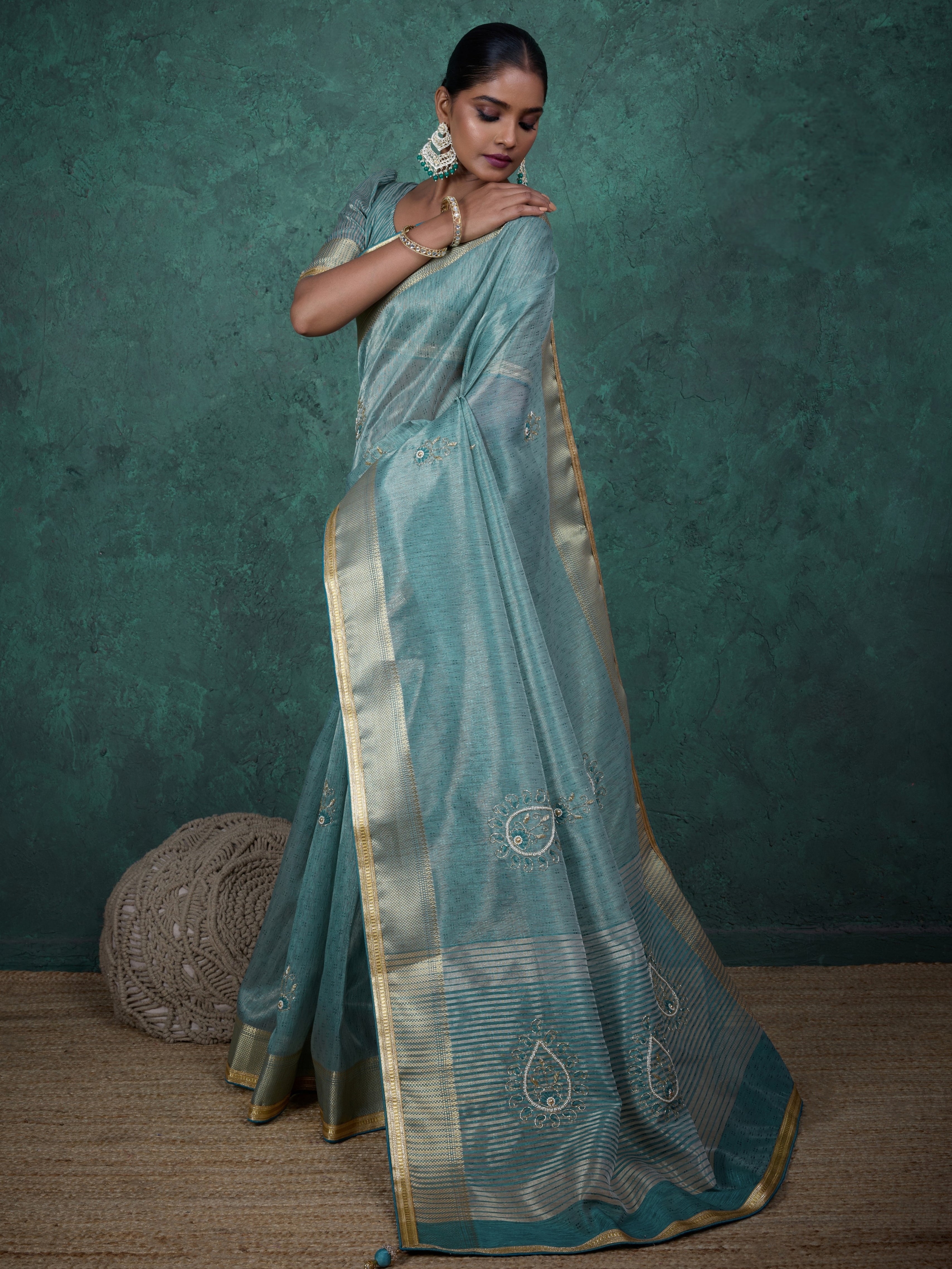 Aqua blue saree in jacquard linen with hand embroidery