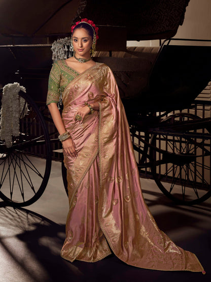 Dusty pink Banarasi saree with green contrast embroidered heavy blouse