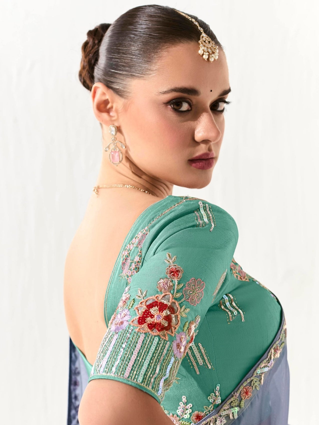 Designer Powder Blue Tissue Saree with Intricate Embroidery and Embellished Border


