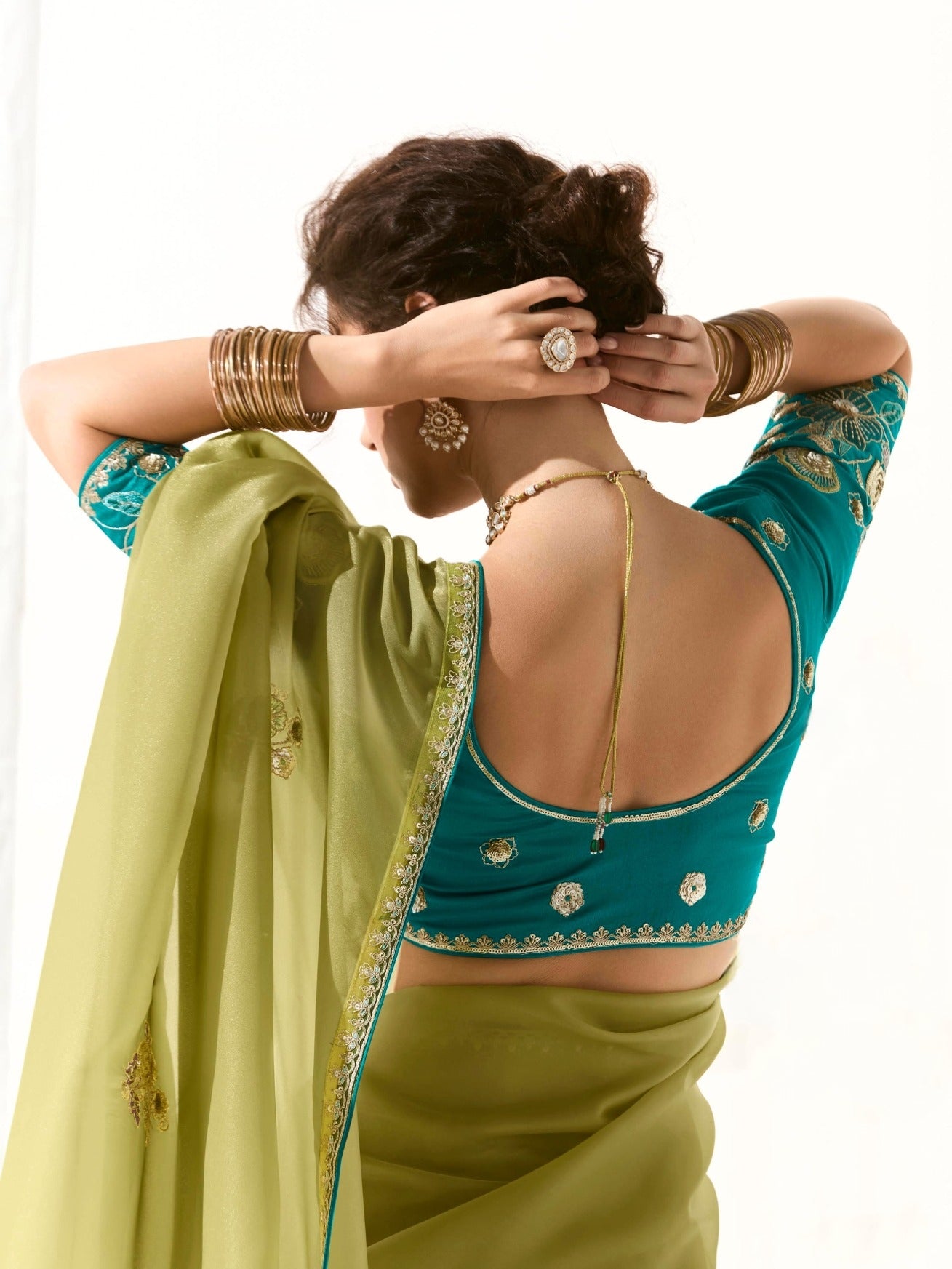 Elegant Lime Green Tissue Saree Featuring Butta Work and Fancy Designer Tassels