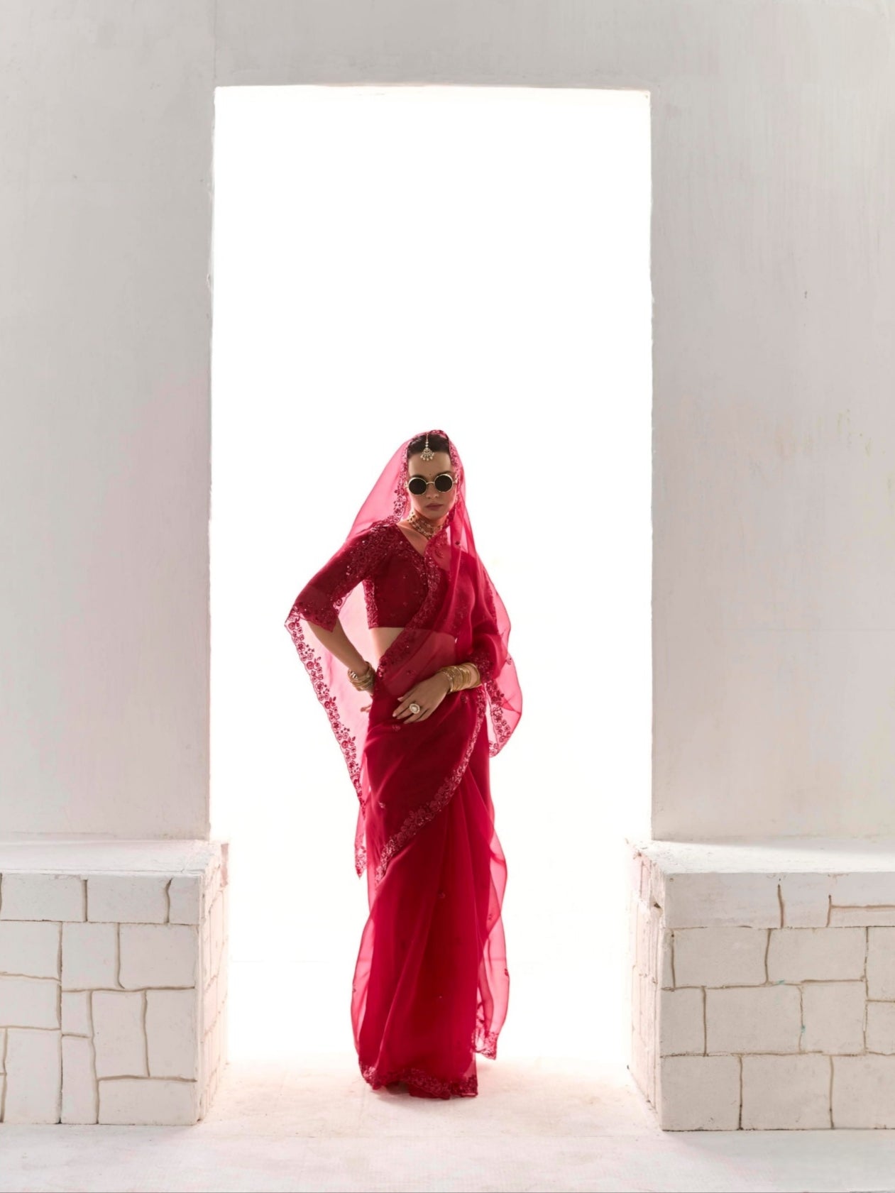 Elegant Deep Red Tissue Saree Featuring Butta Work and Fancy Designer Tassels
