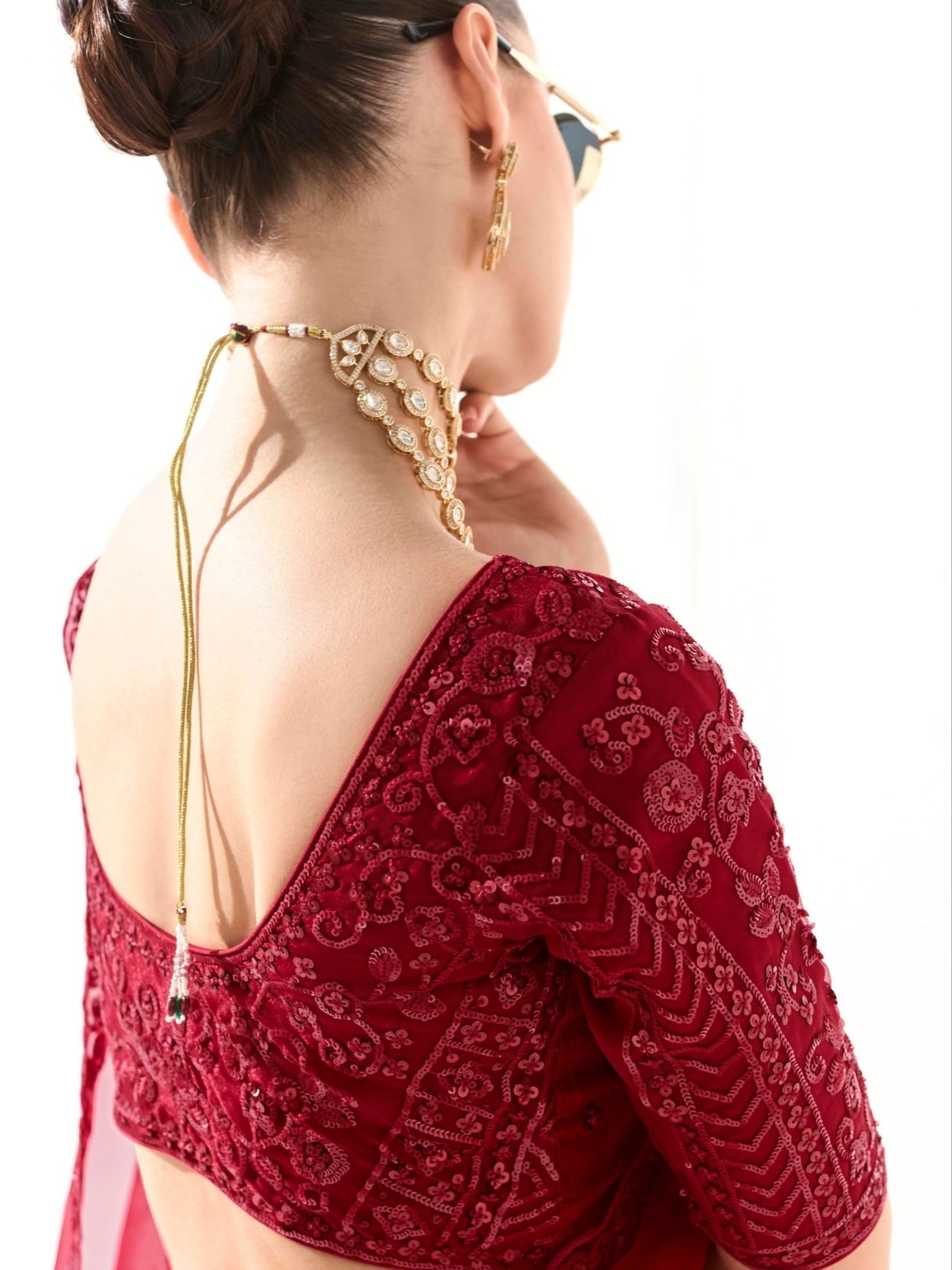 Designer Deep Red Tissue Saree with Intricate Embroidery and Embellished Border