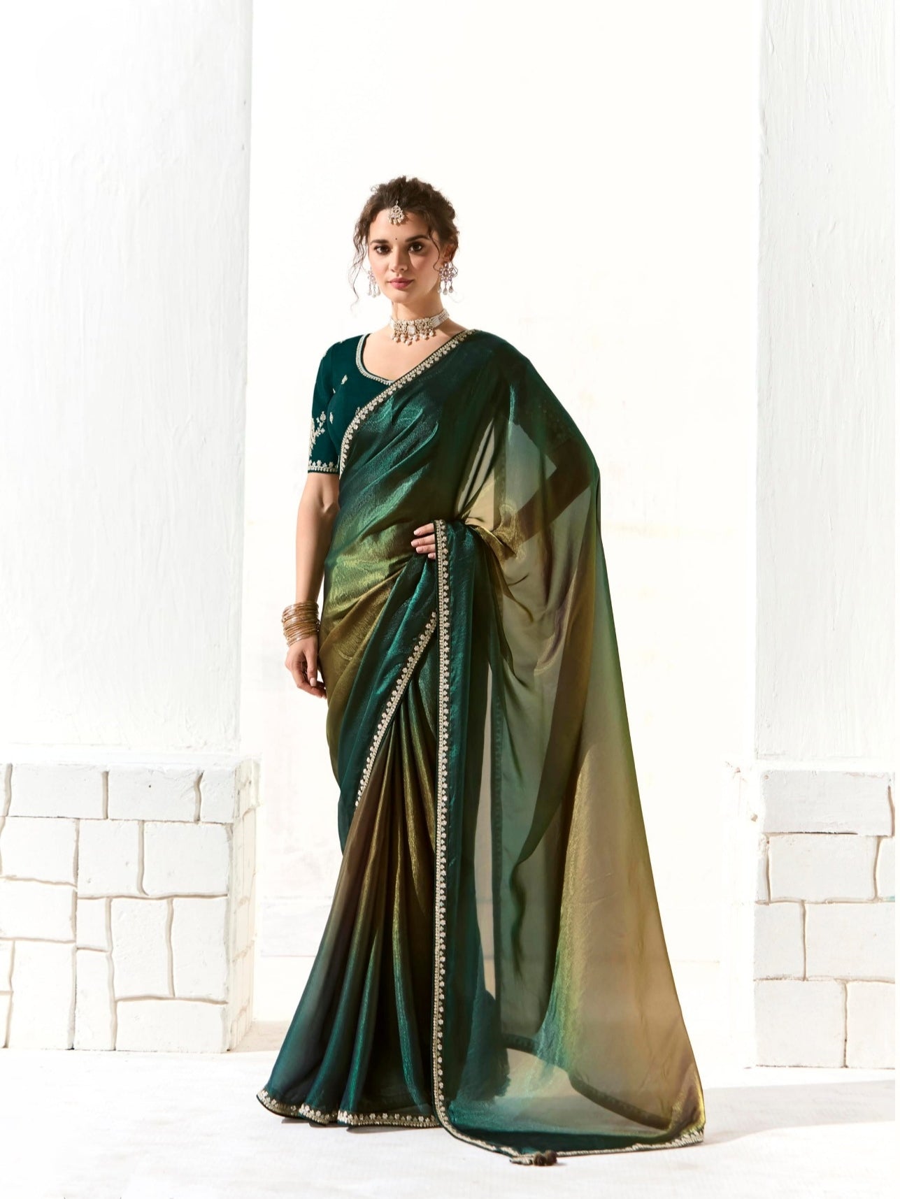 Designer Teal Green Tissue Saree with Intricate Embroidery and Embellished Border

