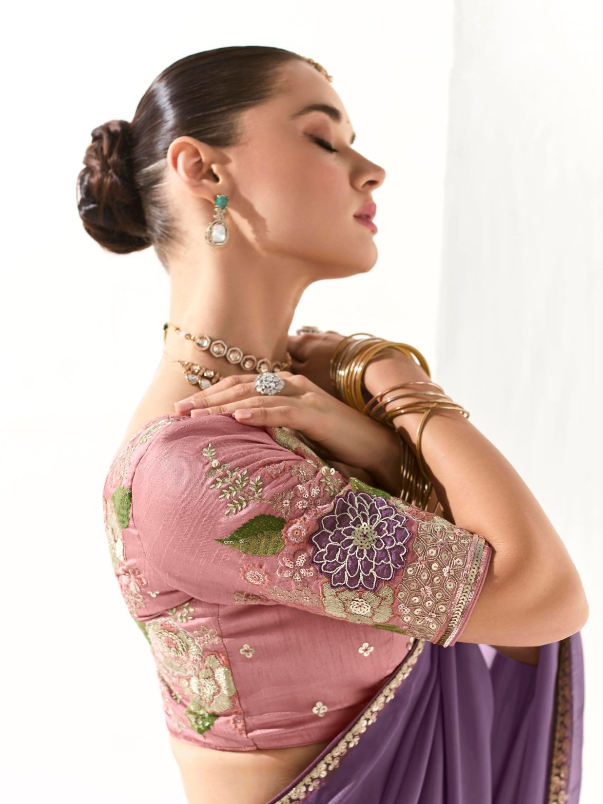 Designer Purple Tissue Saree with Intricate Embroidery and Embellished Border

