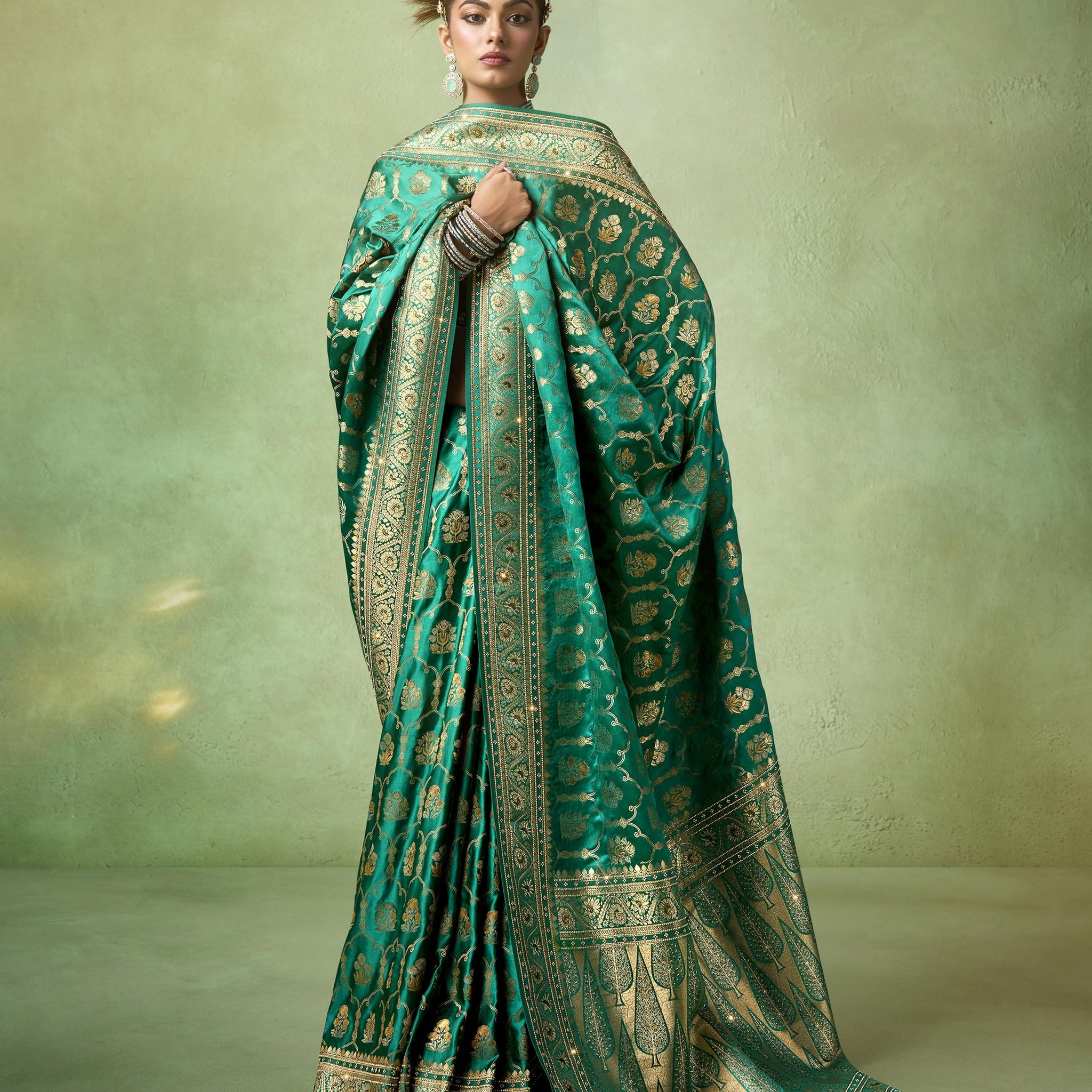 Emerald green bridal saree with Tilfi Zari


