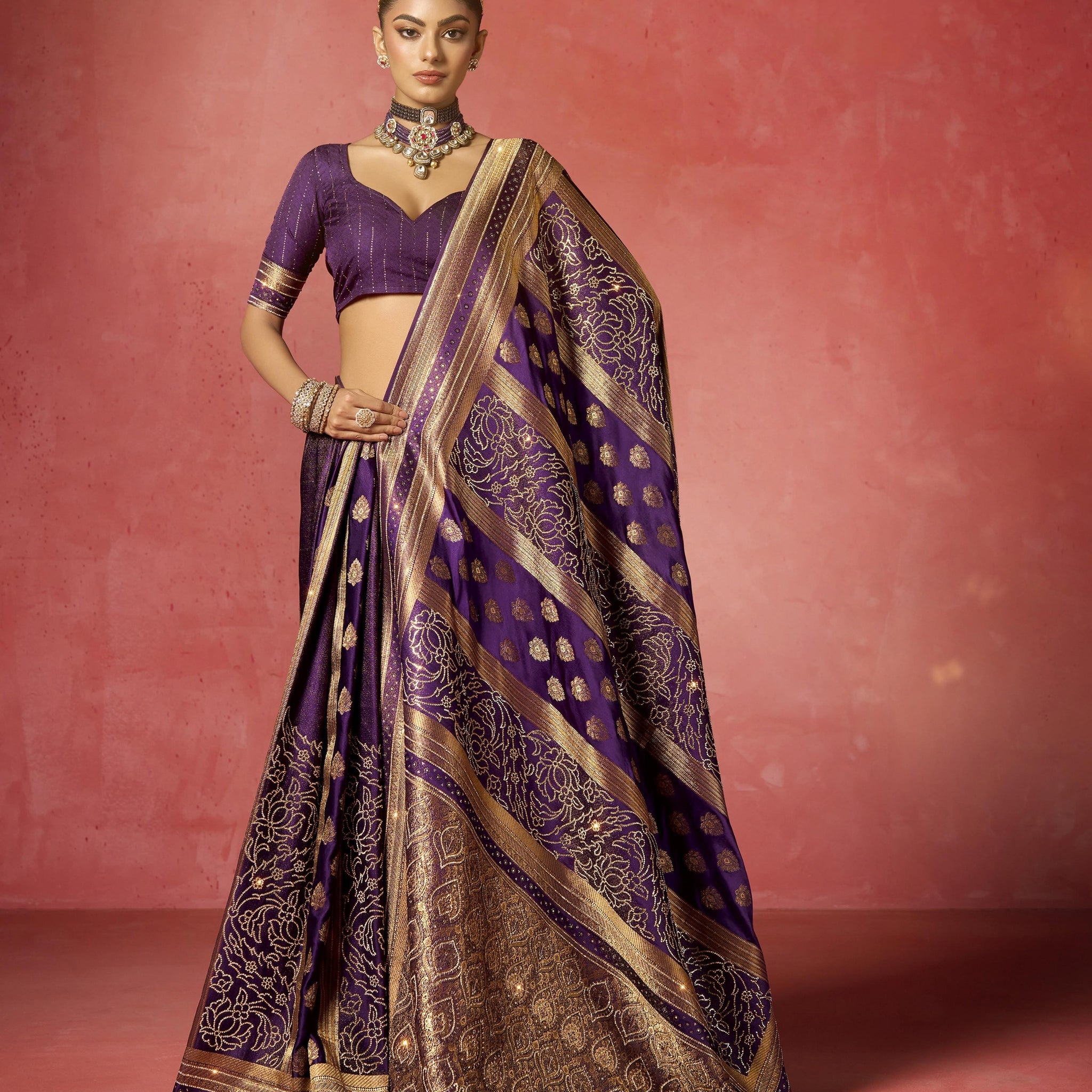 Royal purple bridal saree with heavy zircon and Saroski work