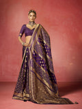Royal purple bridal saree with heavy zircon and Saroski work