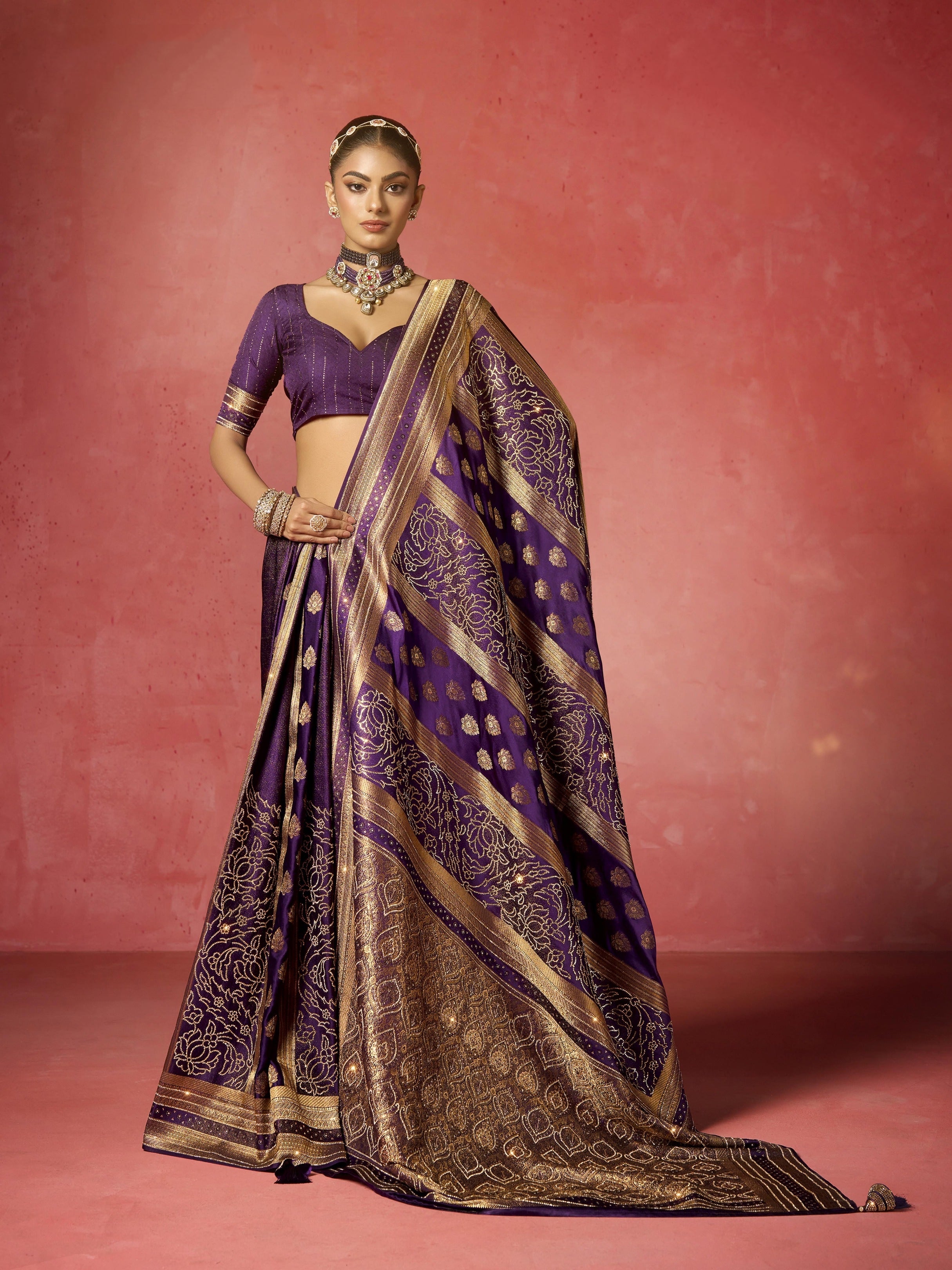 Royal purple bridal saree with heavy zircon and Saroski work