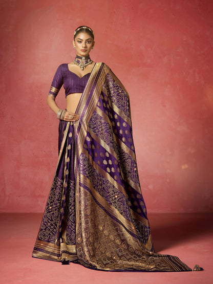 Royal purple bridal saree with heavy zircon and Saroski work