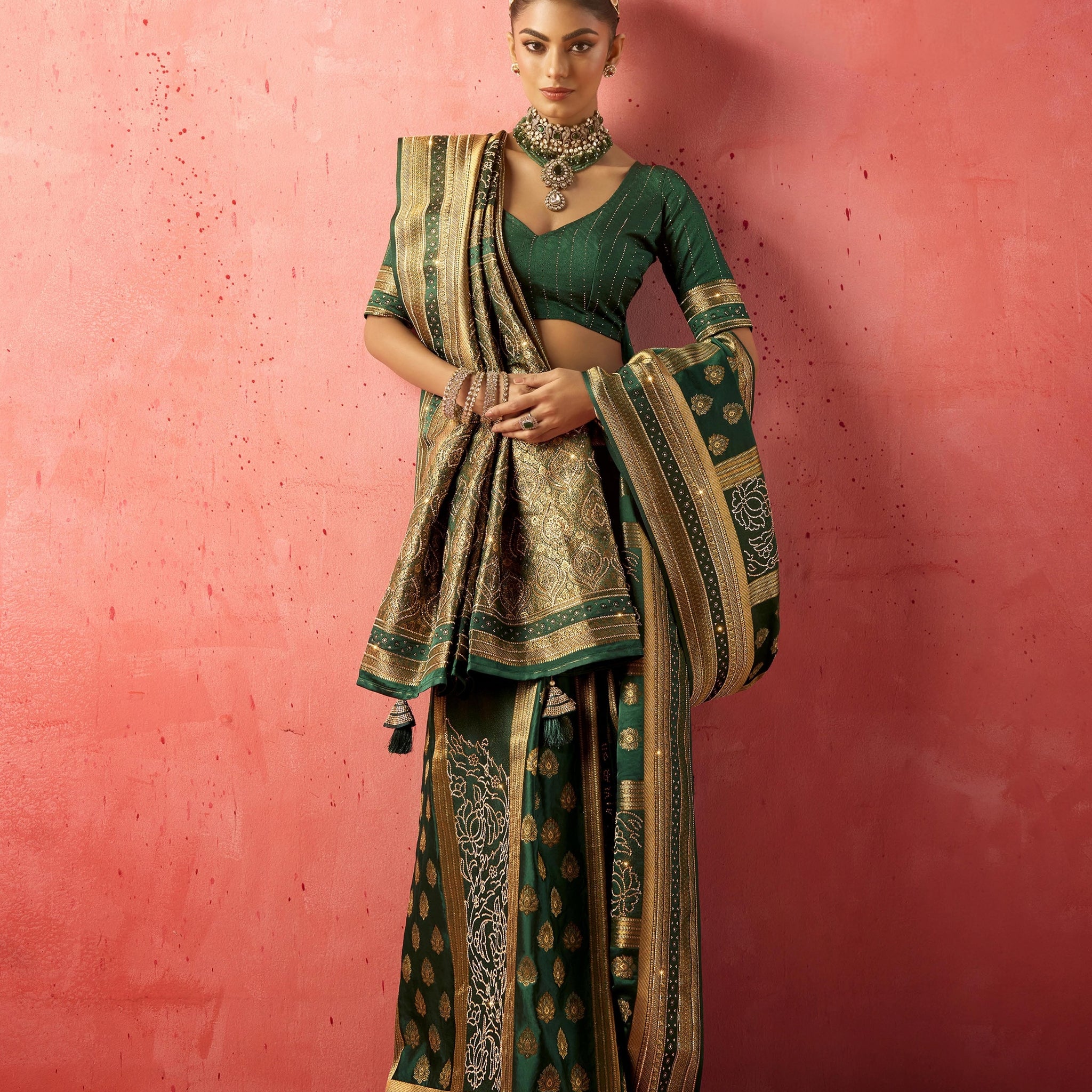 Emerald green bridal saree with heavy zircon and Saroski work

