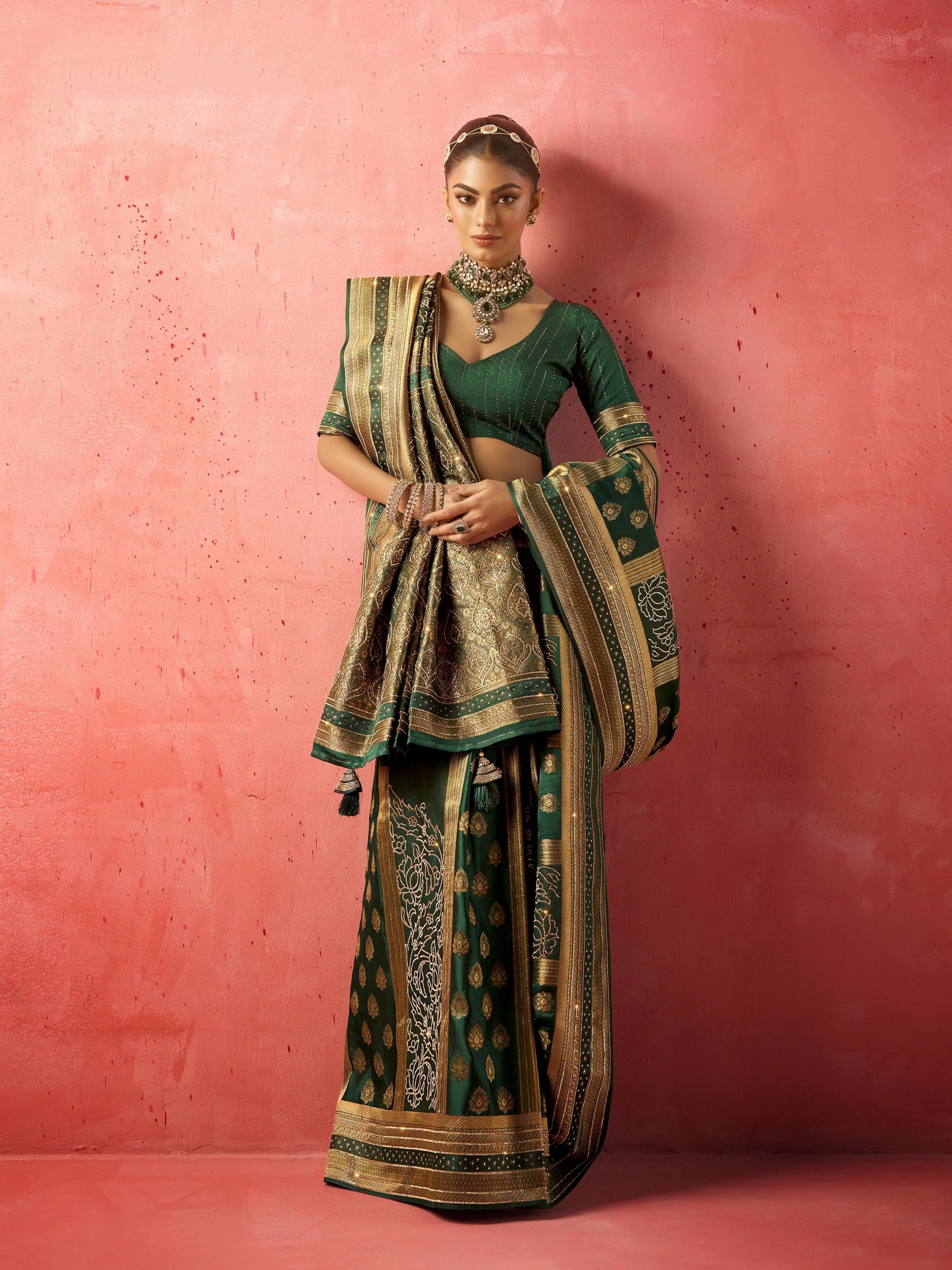Emerald green bridal saree with heavy zircon and Saroski work

