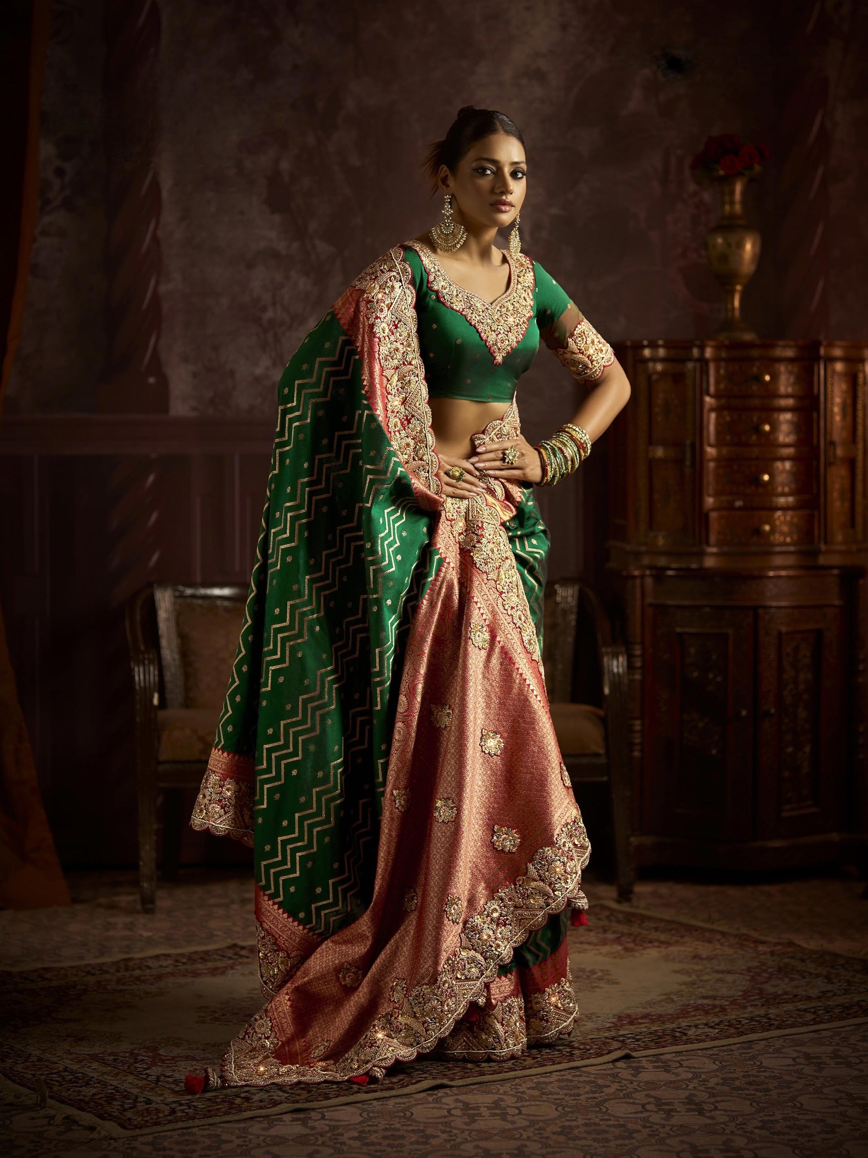 Emerald green bridal saree with peach border

