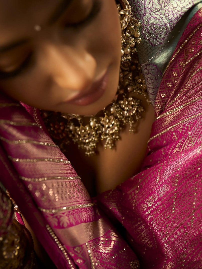 Pink and silver Kanjivaram wedding saree for bride

