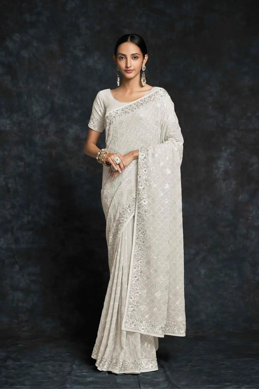 Ivory white georgette saree with sequin embroidery

