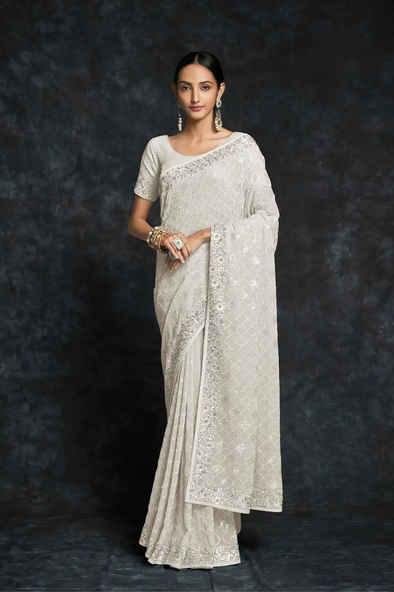 Ivory white georgette saree with sequin embroidery

