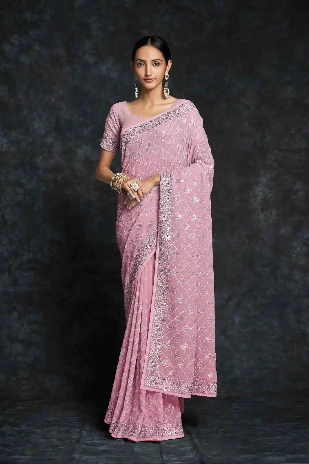 Baby pink embroidered georgette saree front view


