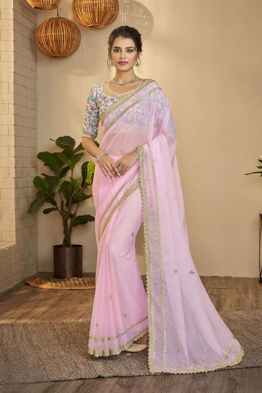 Light baby pink georgette saree with golden lace front view

