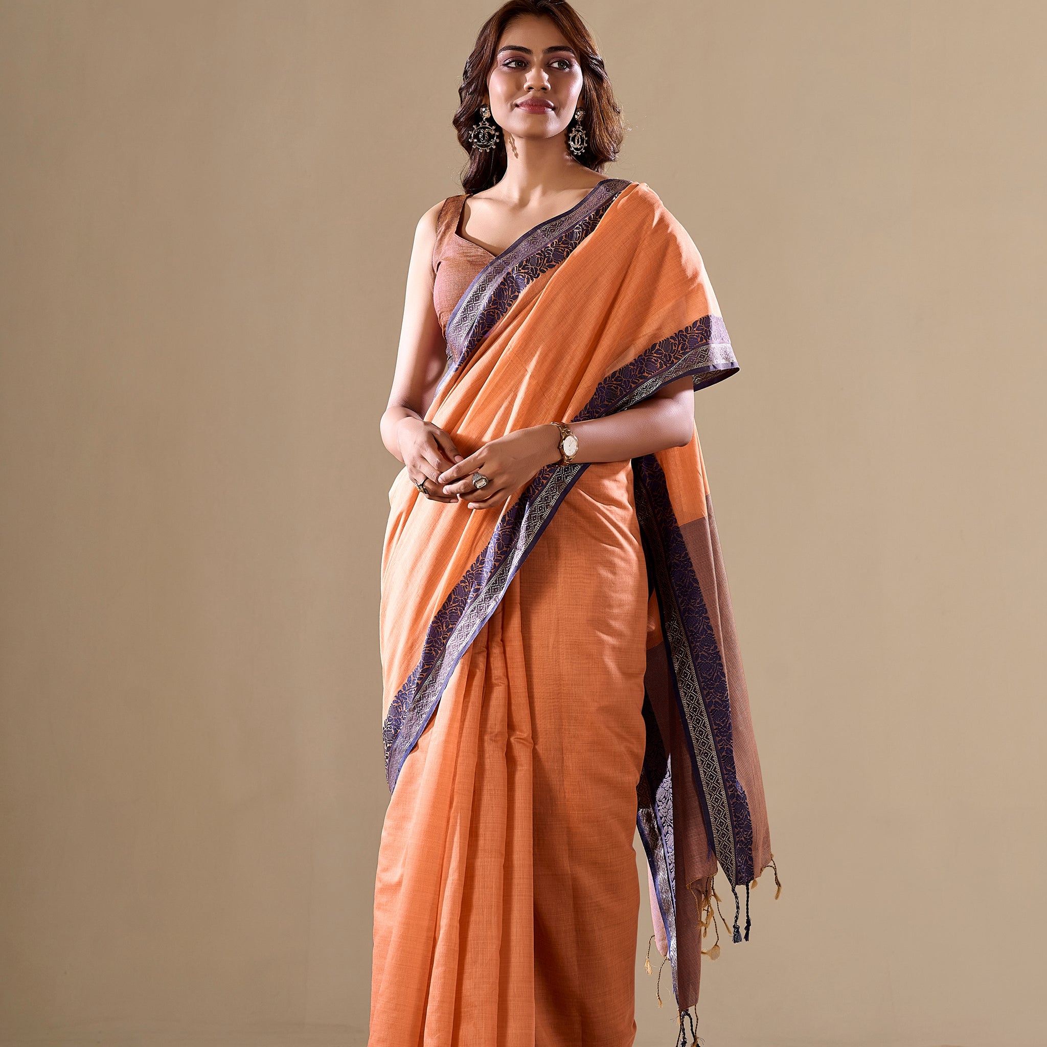 Orange handloom saree with blue border

