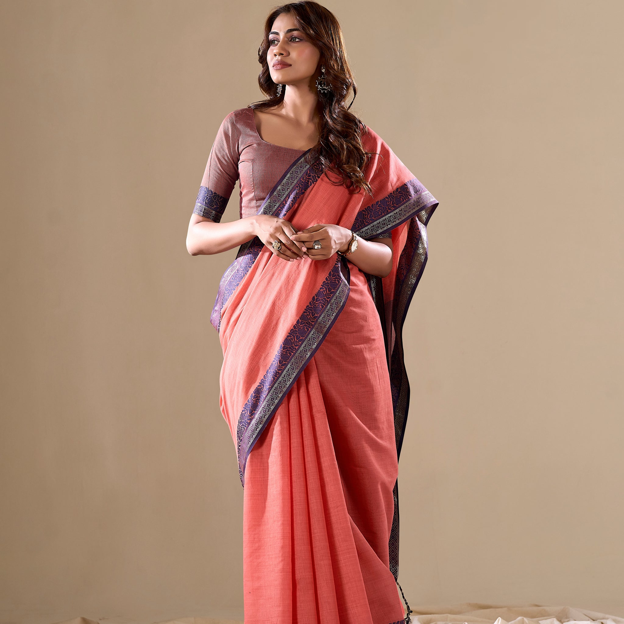 Peach handloom saree with blue pallu

