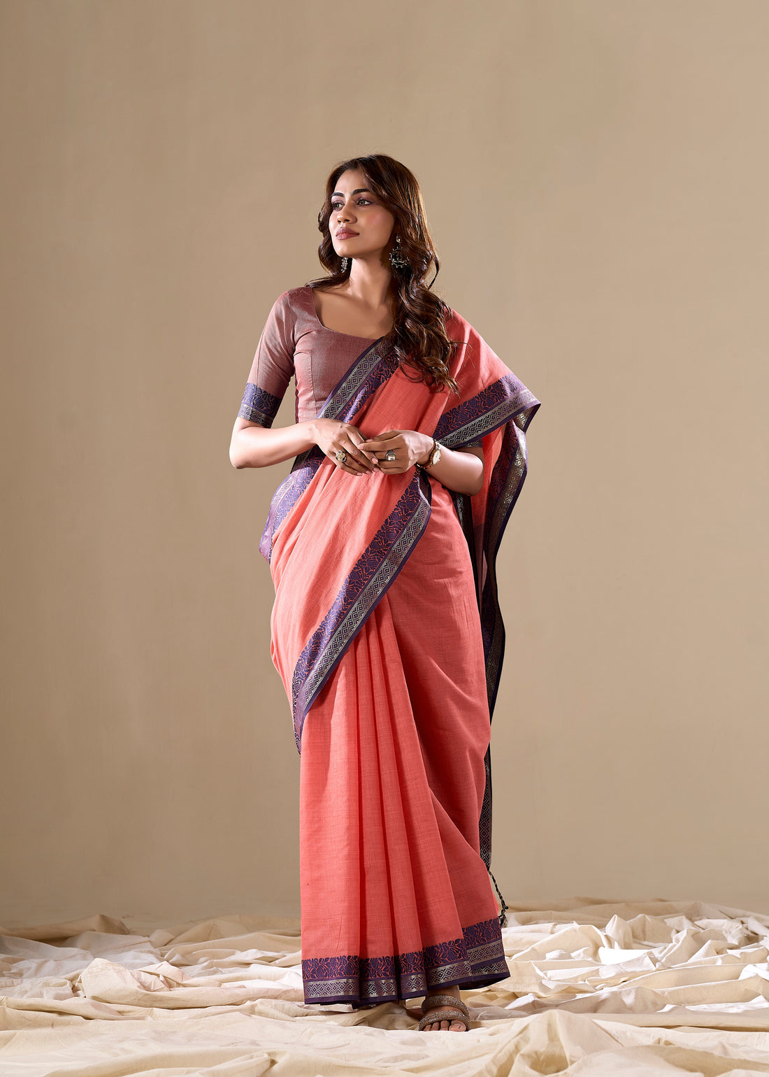 Peach handloom saree with blue pallu

