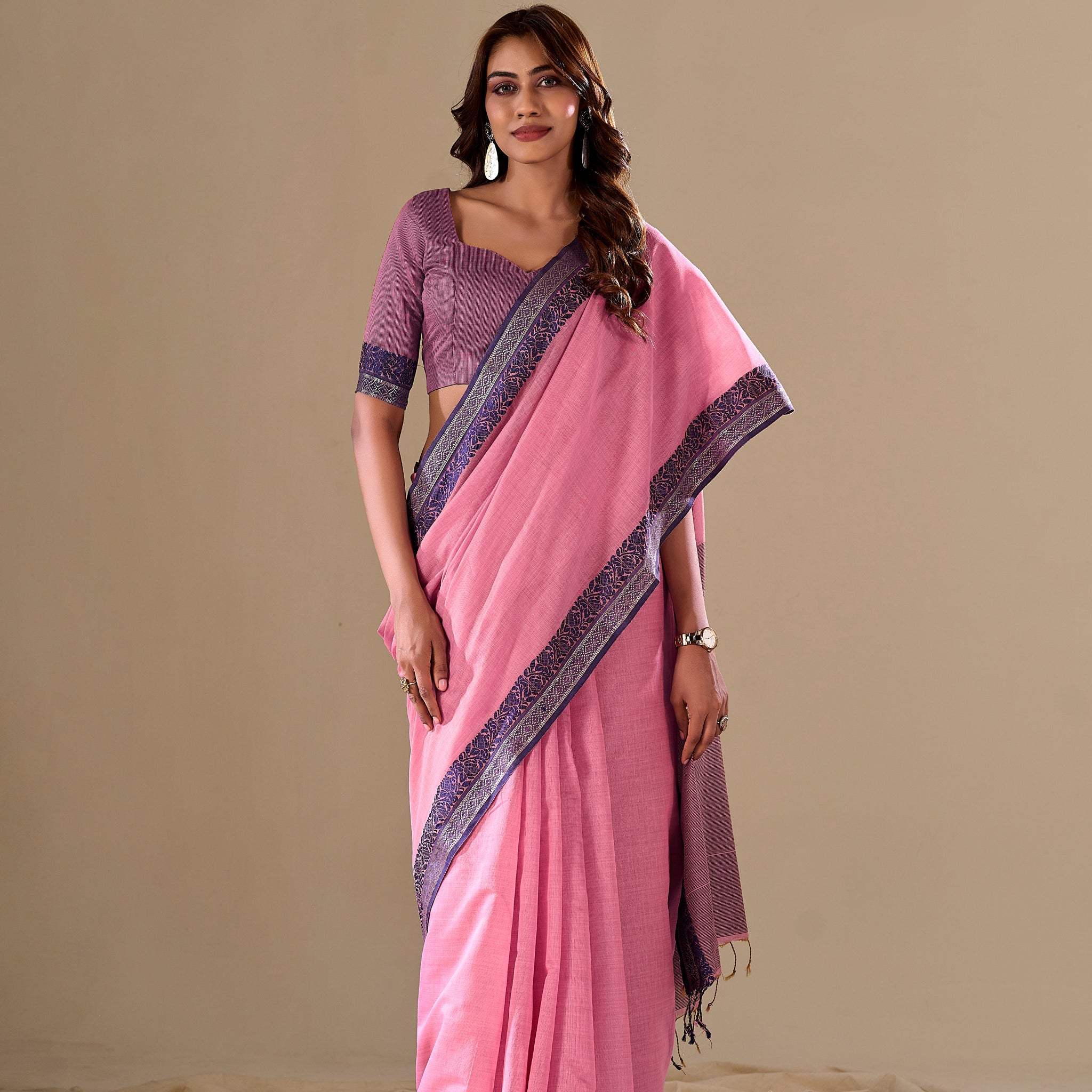 Pink handloom saree with purple border

