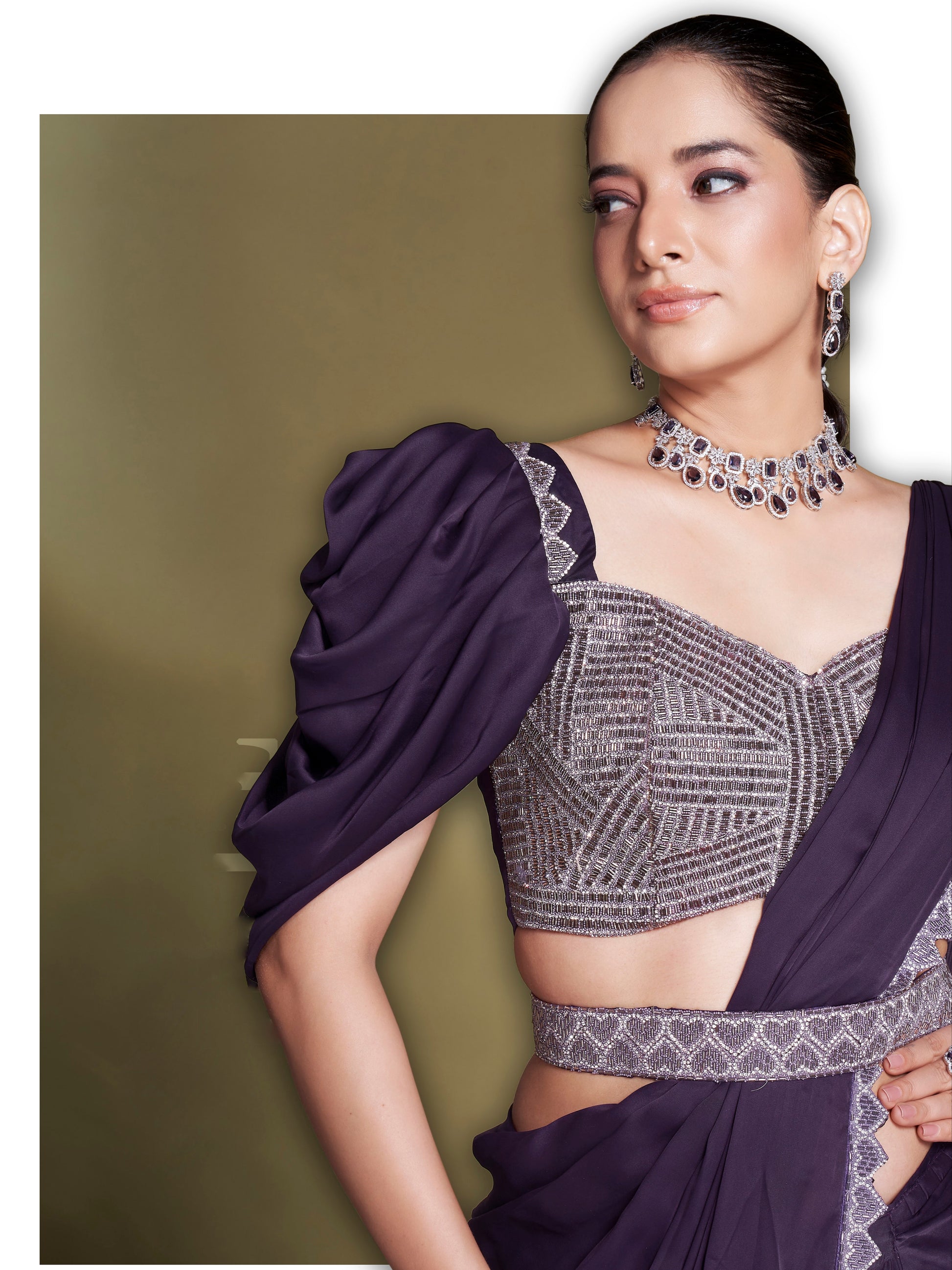 Close-Up of Embroidery on Poly Crepe Blouse Paired with Purple Saree

