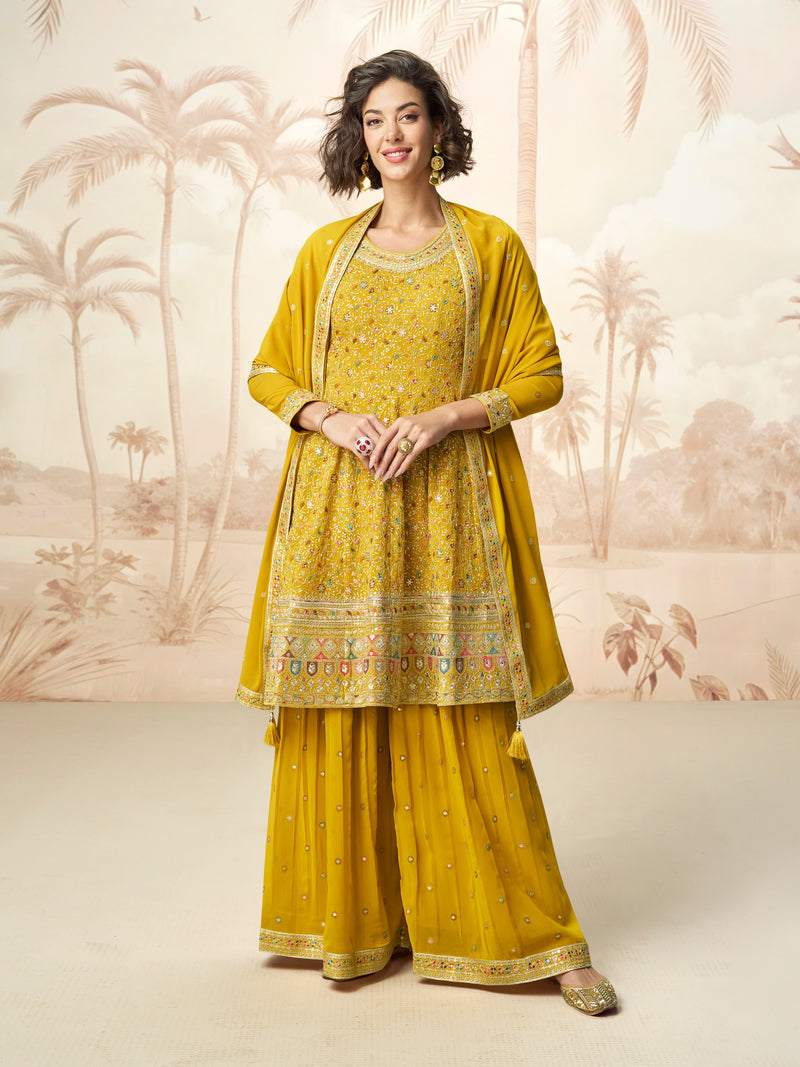 Mustard yellow embroidered georgette sharara suit front view