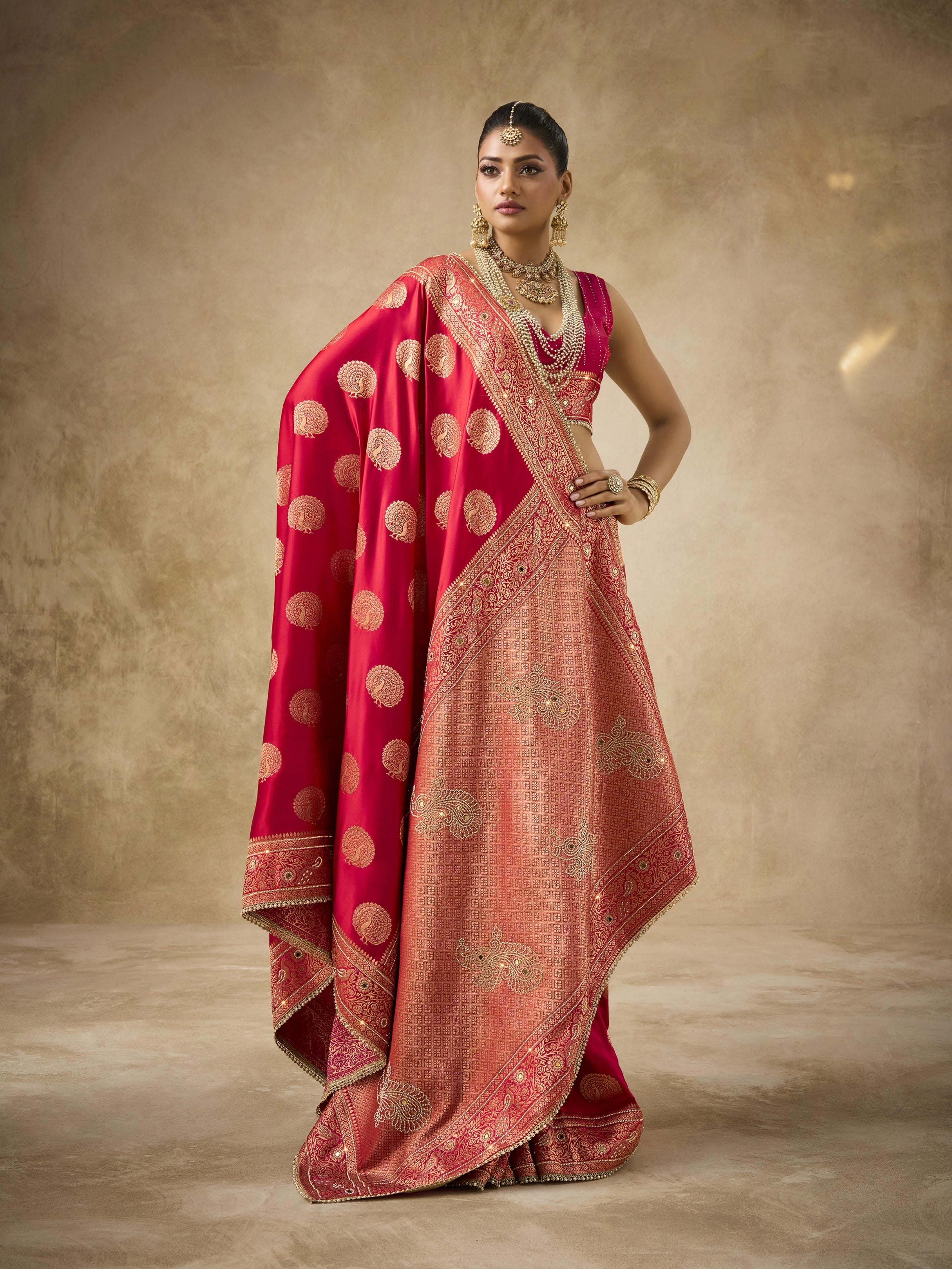 Red satin bridal saree with polka pallu