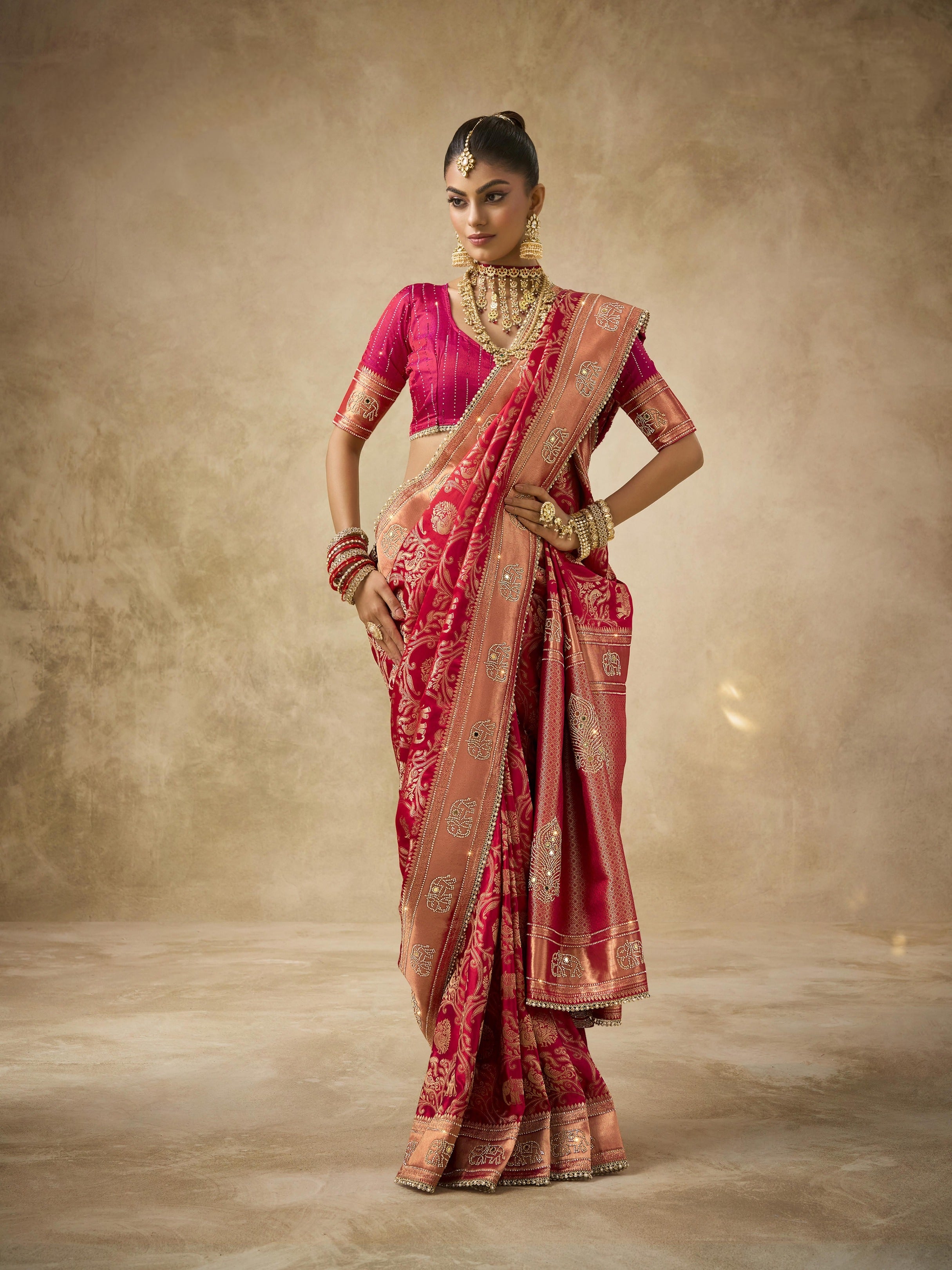 Red satin bridal saree with floral weave design