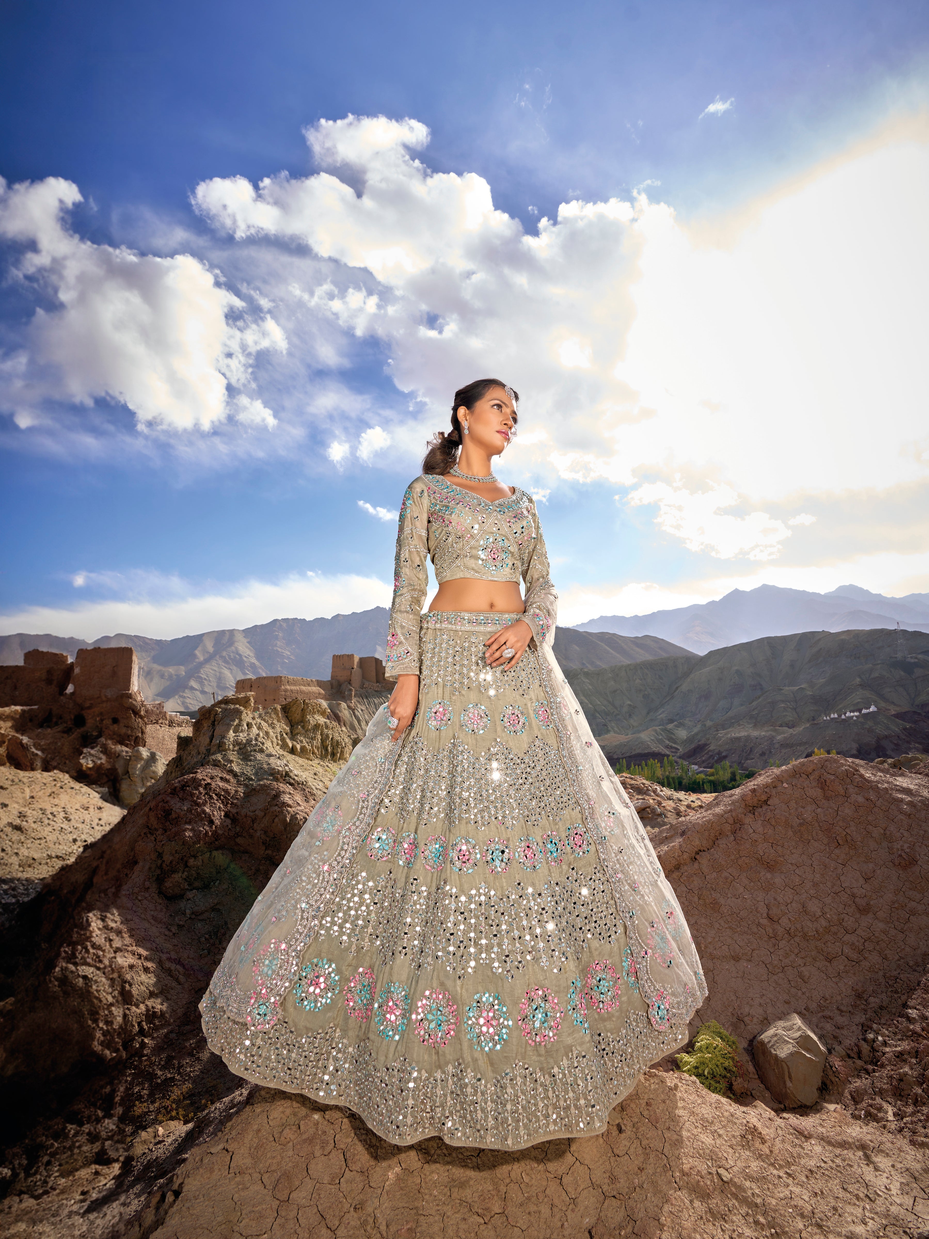Beige bridal lehenga choli with multicolor floral embroidery