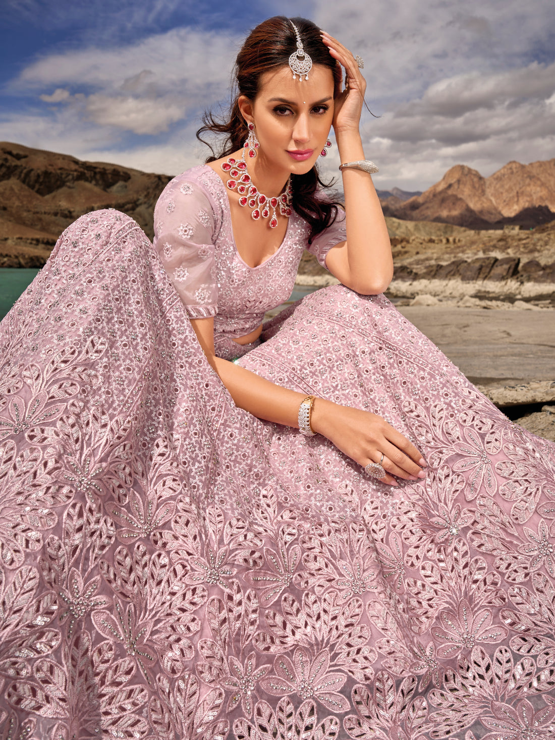 Lilac organza bridal lehenga choli with mirror and zarkan work