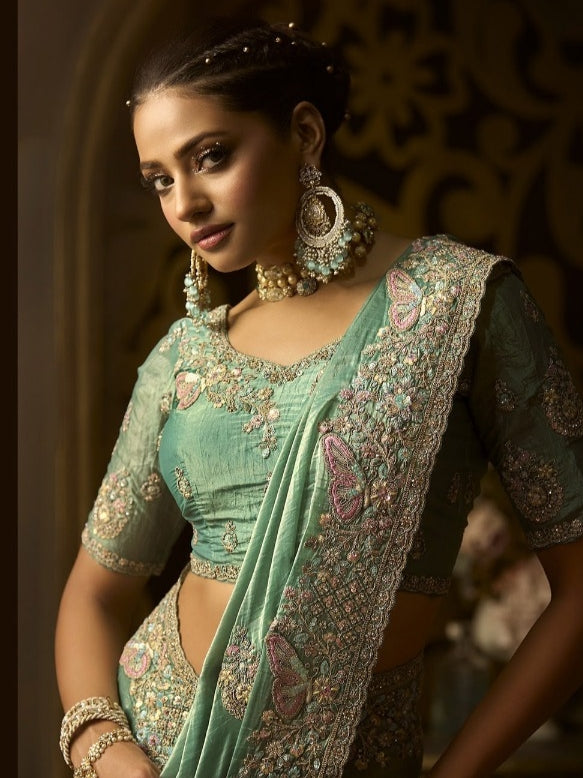 Mint green wedding saree in golden silk