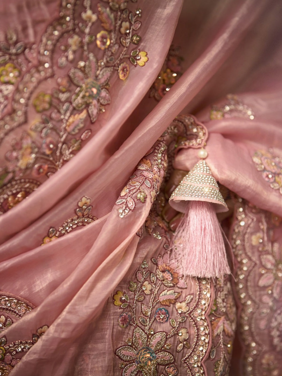 Traditional bridal saree in golden silk and blush pink