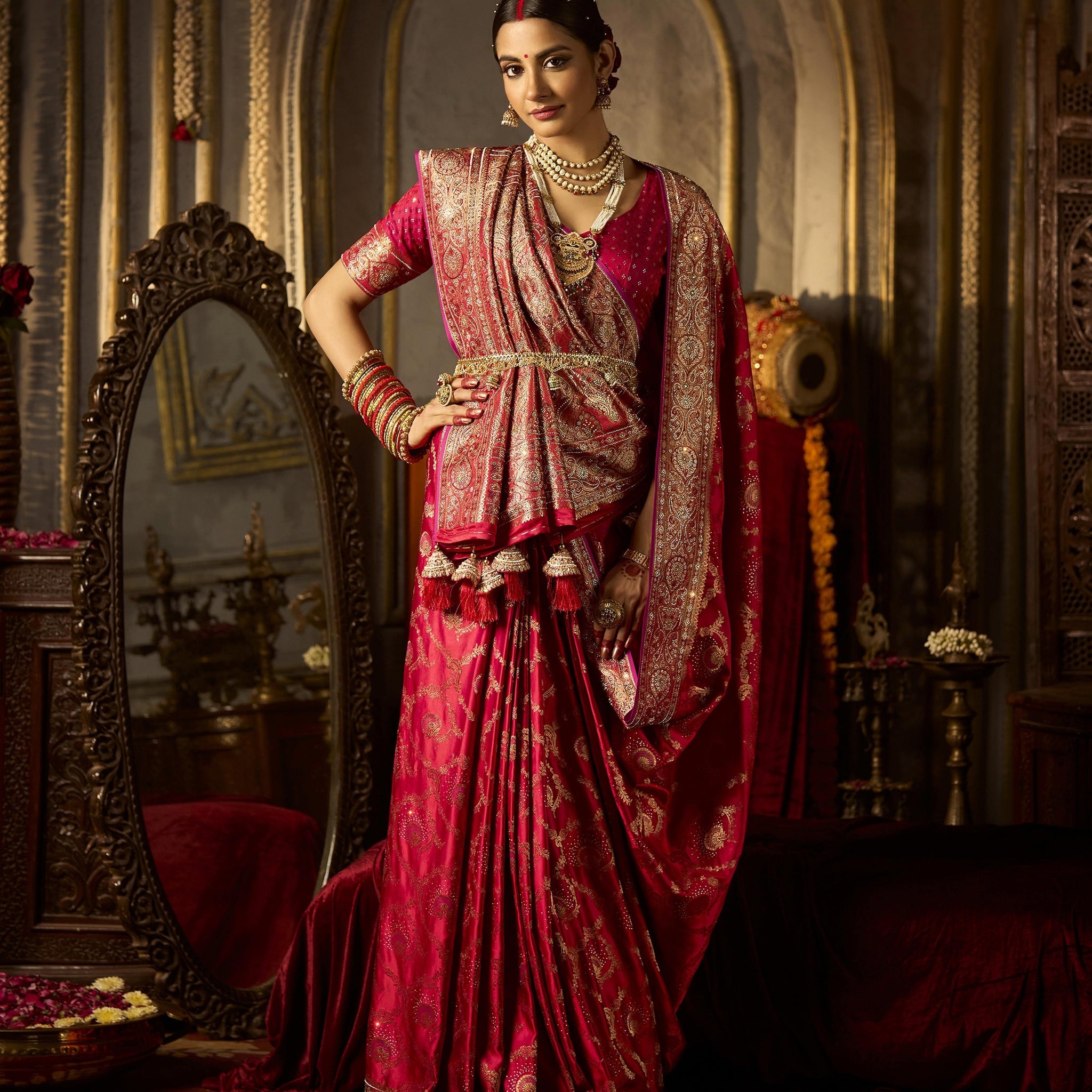 Elegant red satin silk bridal saree with heavy zircon and handwork

