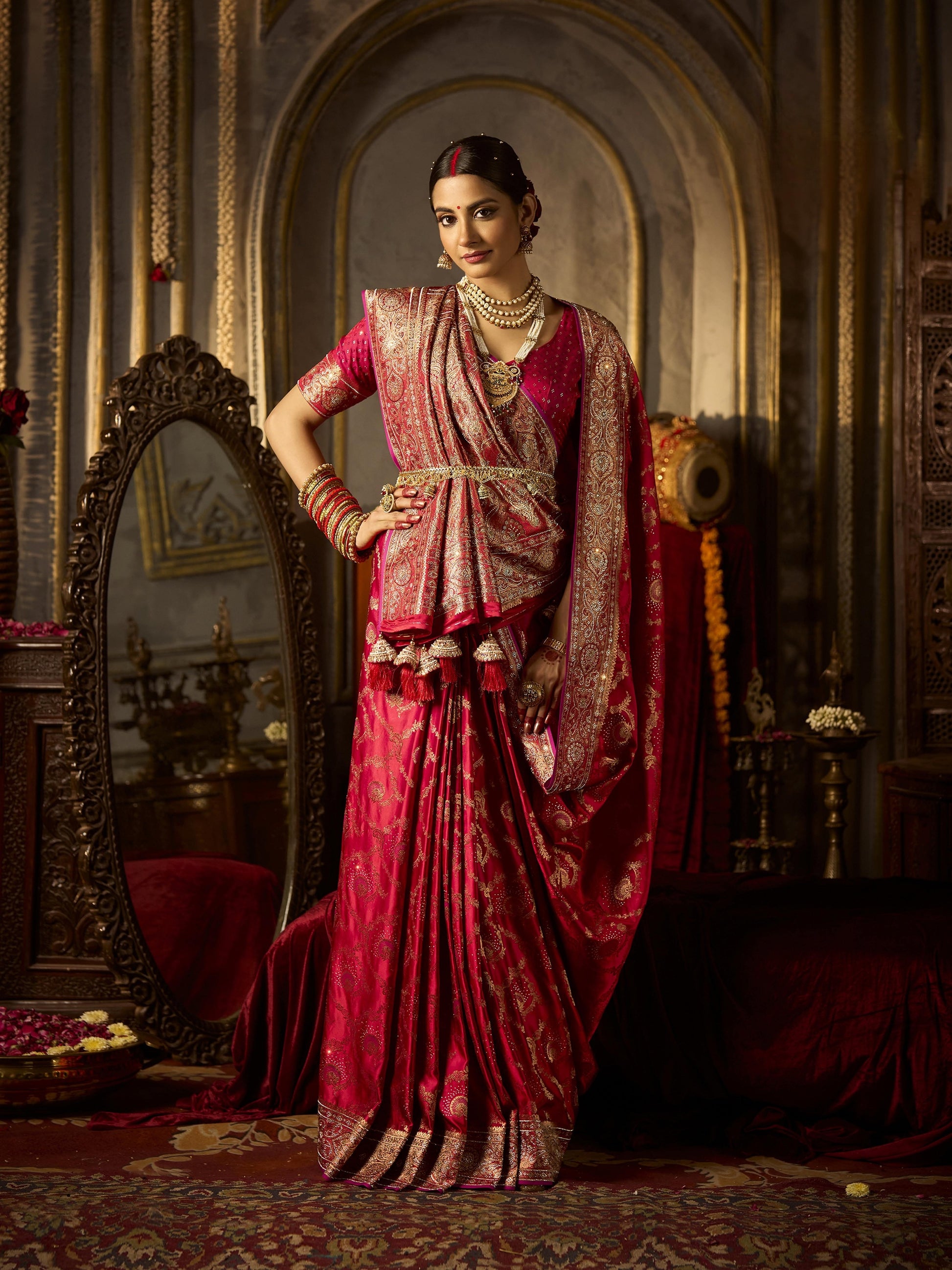 Elegant red satin silk bridal saree with heavy zircon and handwork

