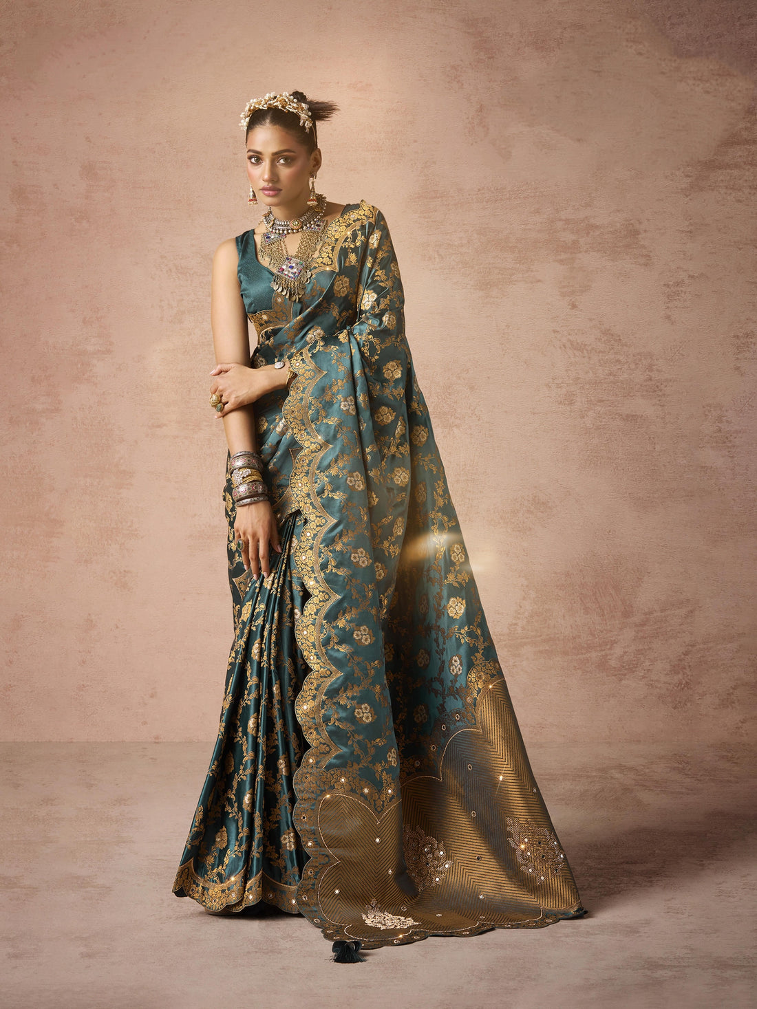 Teal blue satin bridal saree with Zarkan embroidery

