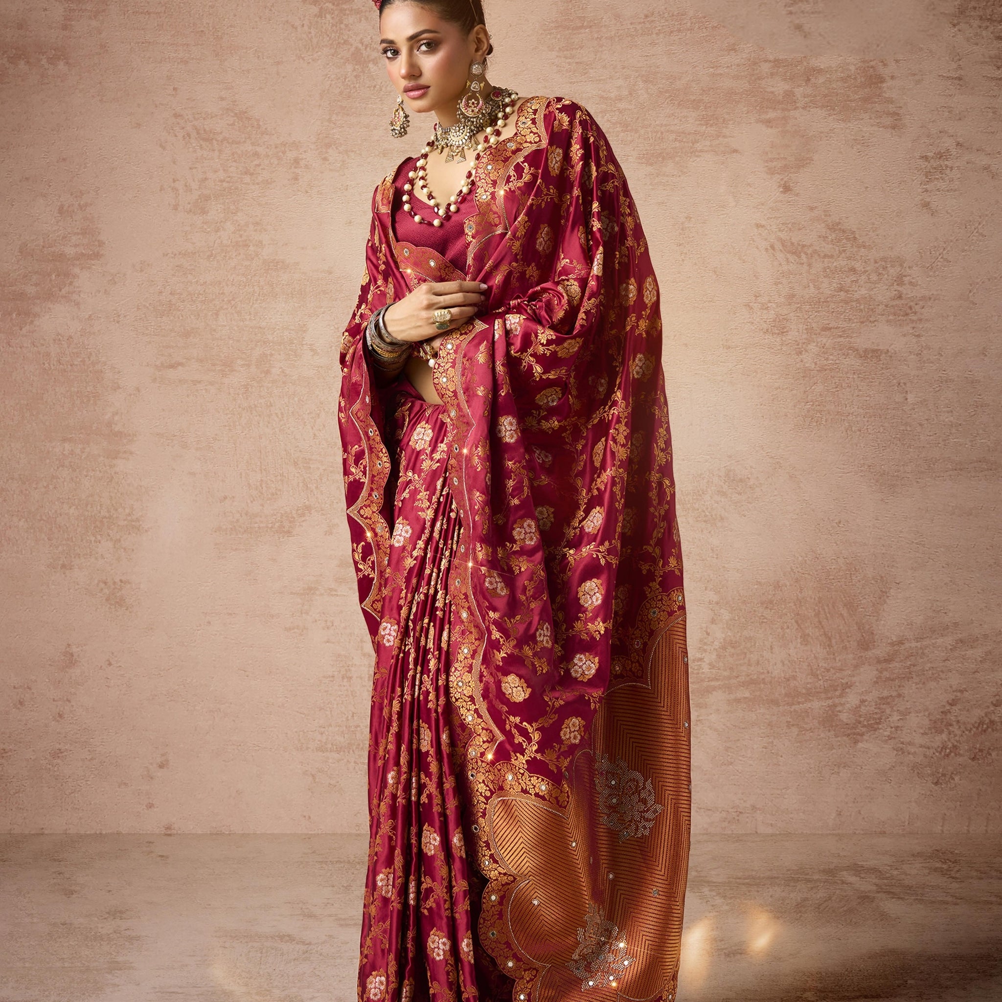 Red satin bridal saree with full Zarkan work

