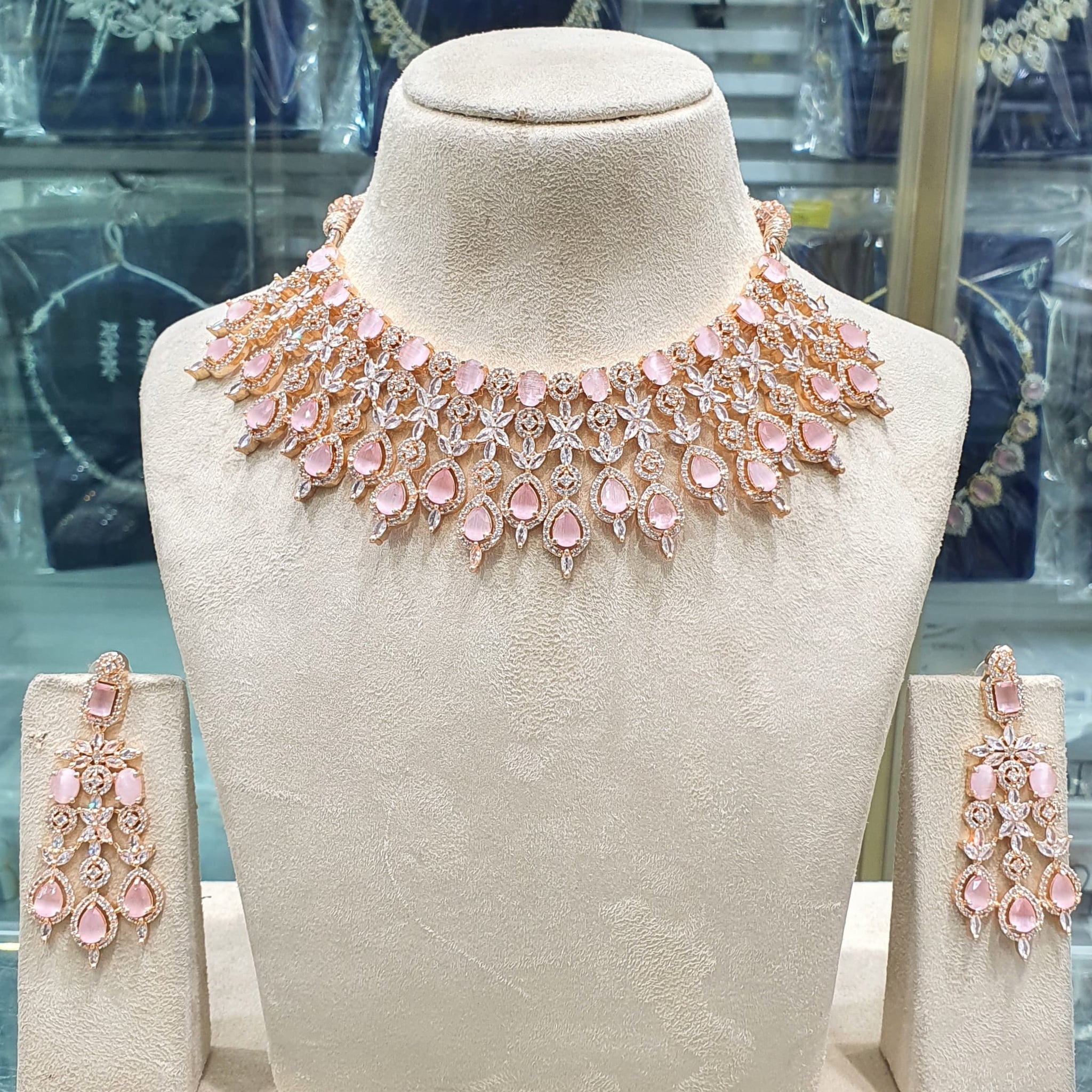 Peach bridal necklace set on mannequin