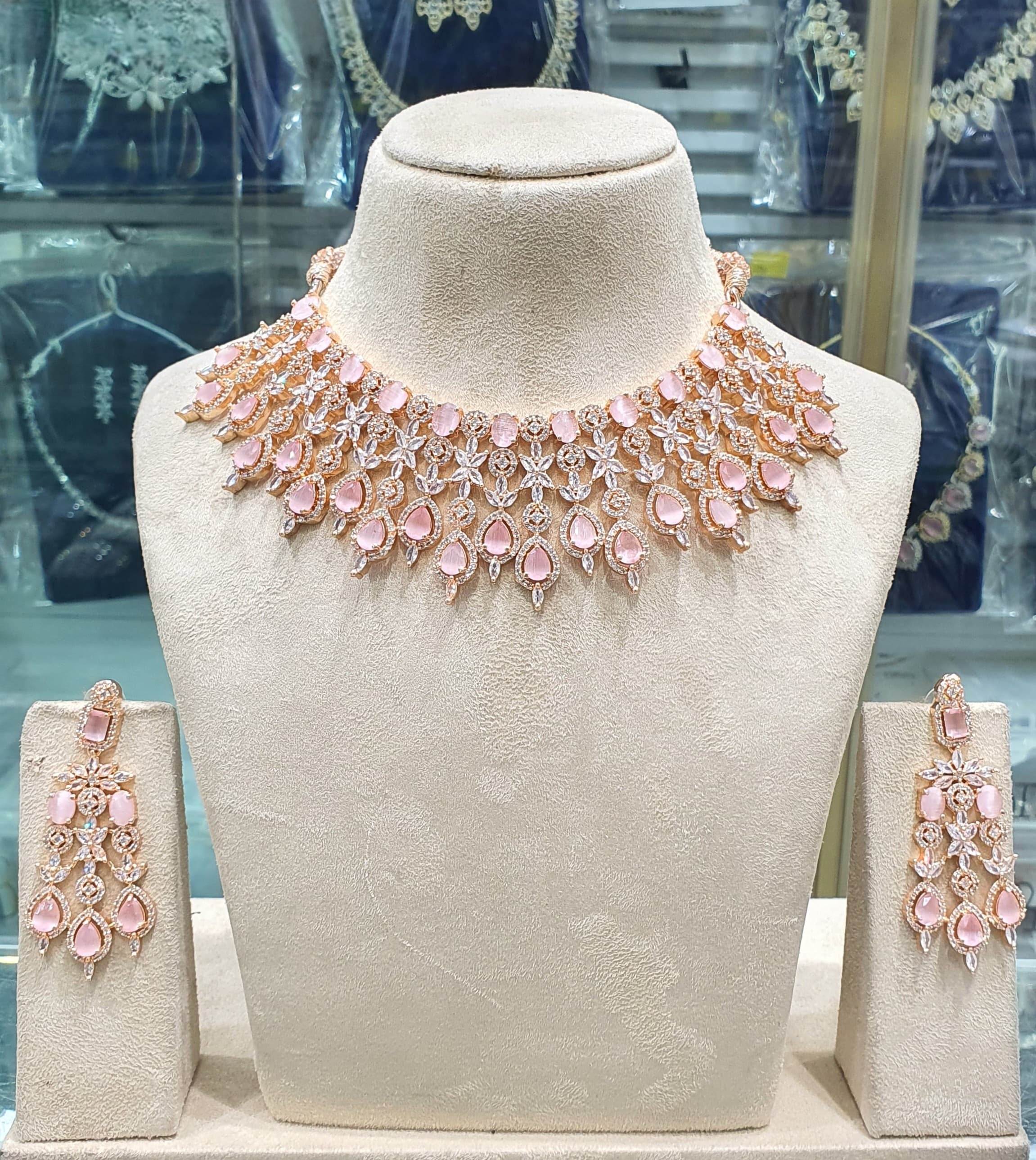 Peach bridal necklace set on mannequin