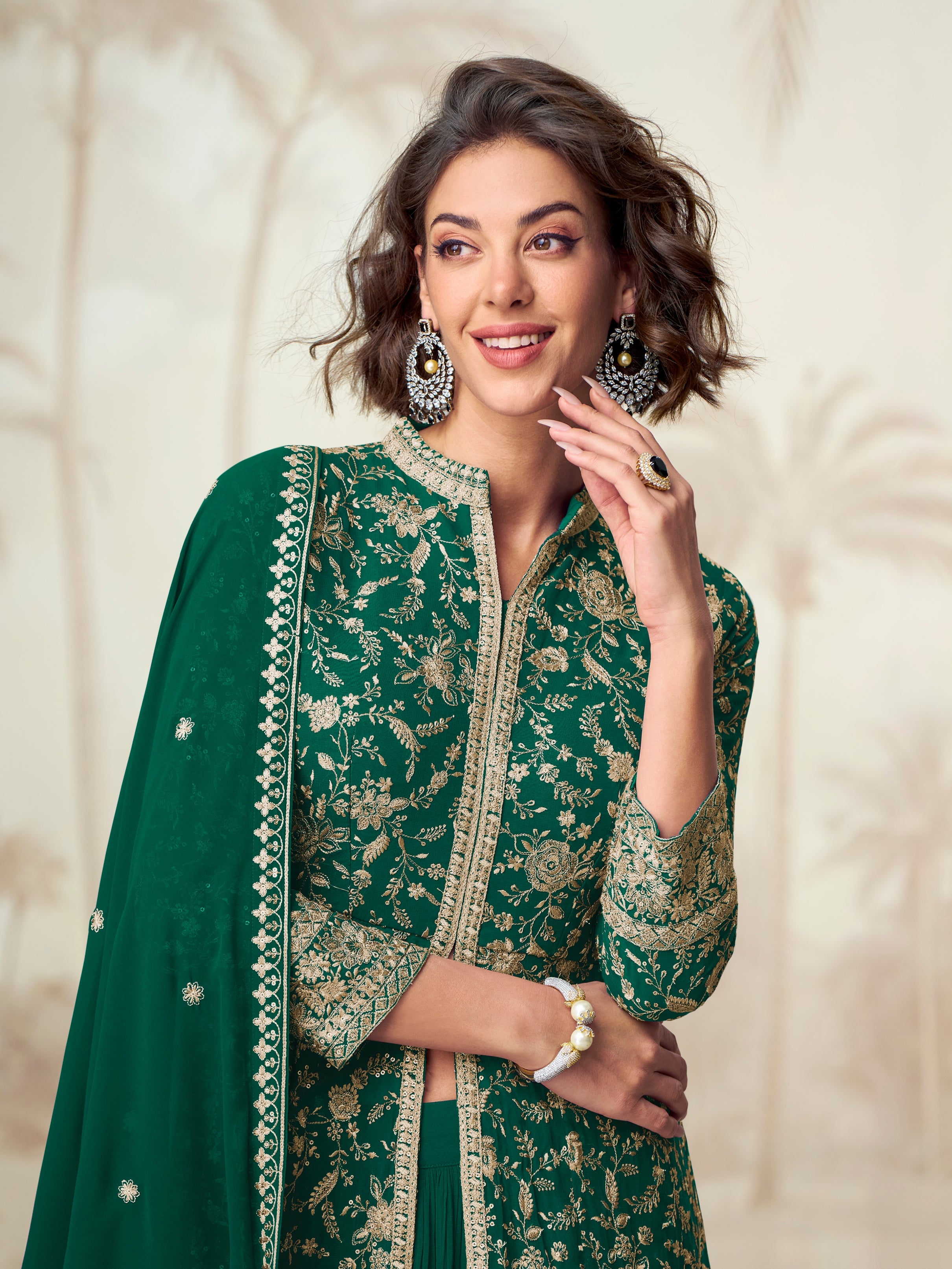 Embroidered green suit for festive functions