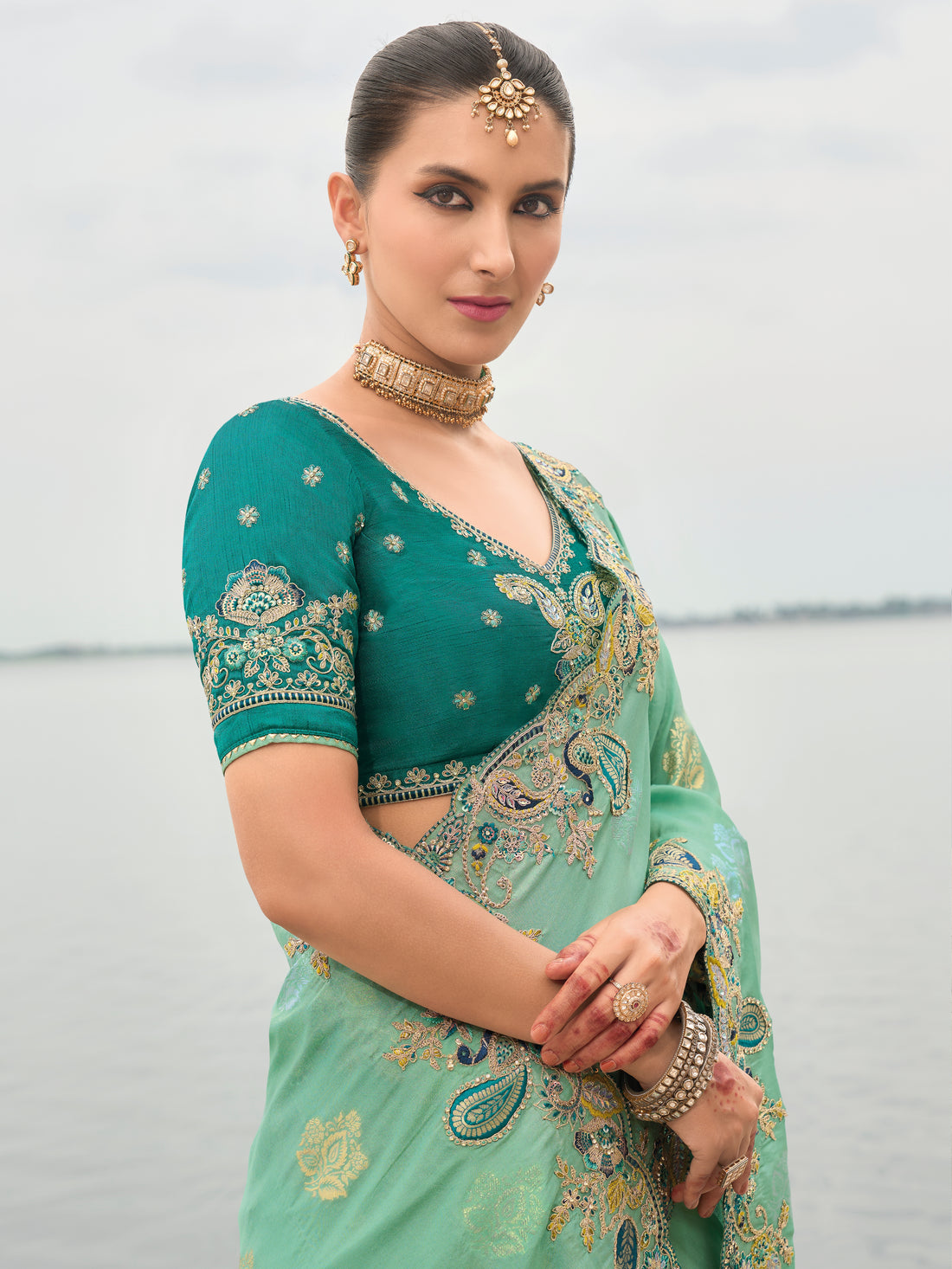 Mint green tissue silk saree with stone and sequin embroidery
