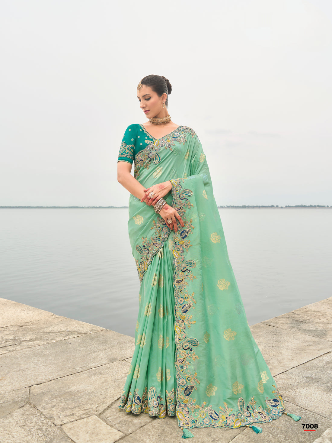 Mint green tissue silk saree with stone and sequin embroidery