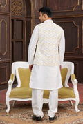 Men’s traditional attire in off-white