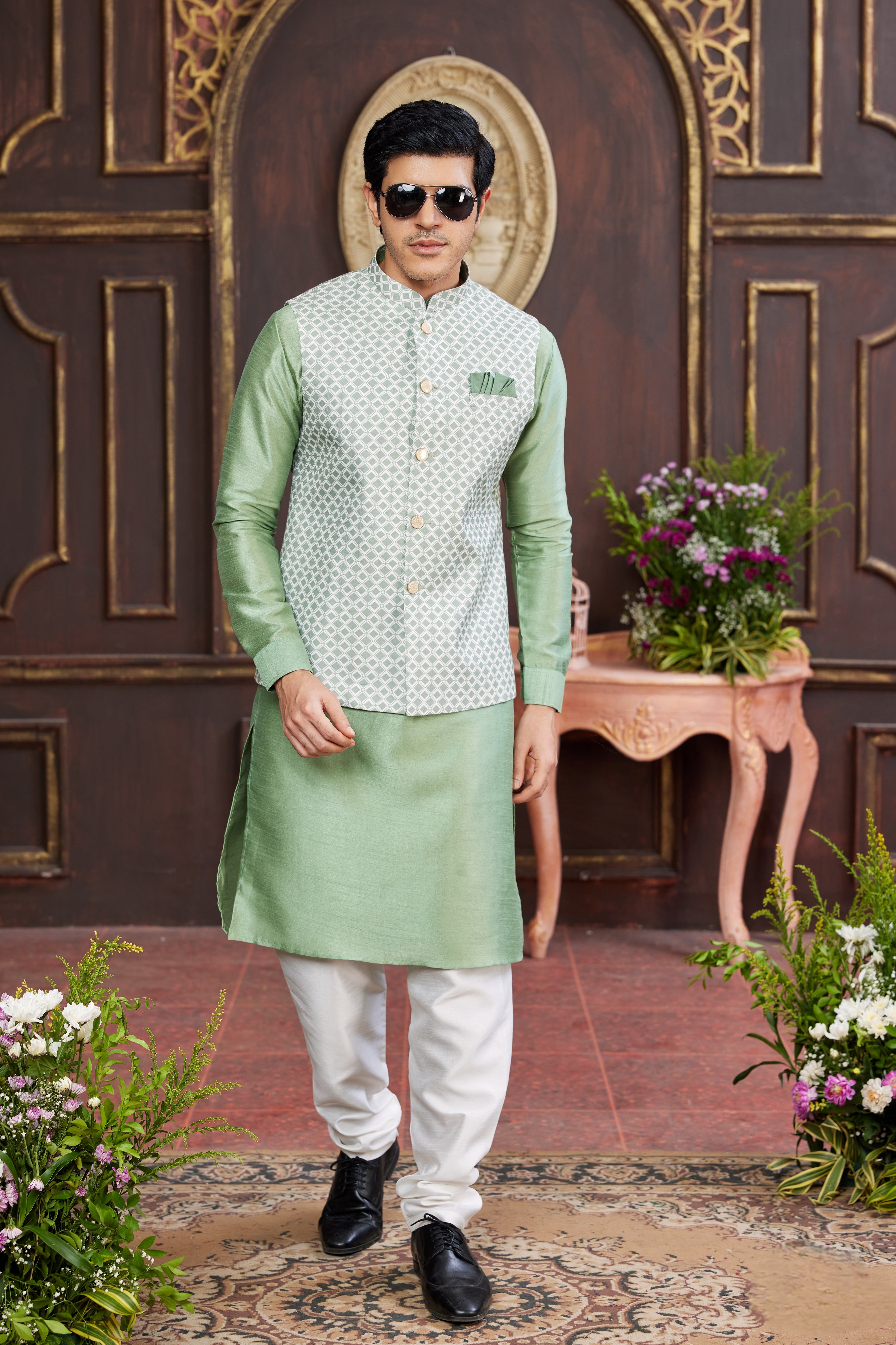 Mint green kurta pajama with white jacket