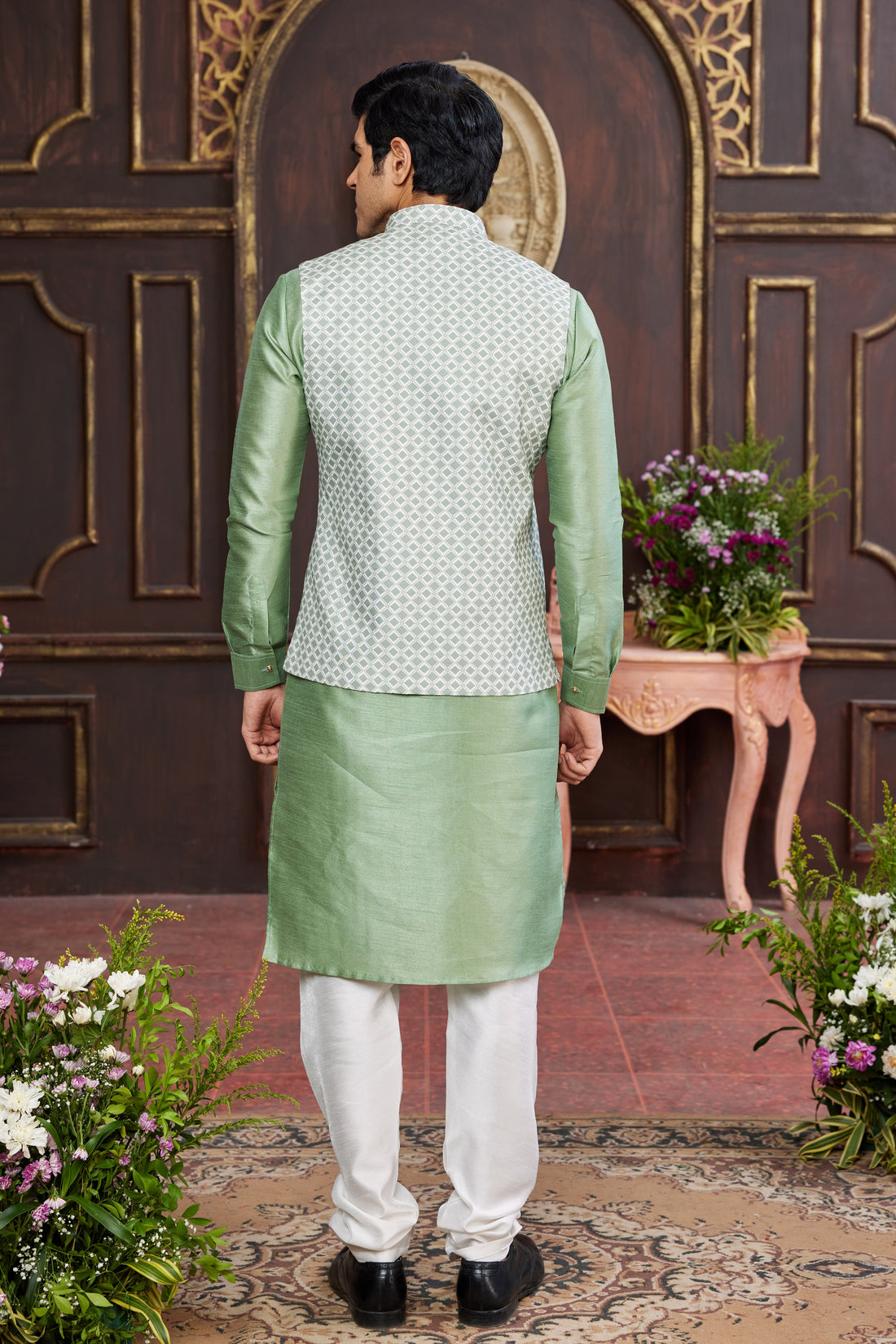 Mint green kurta pajama with white jacket