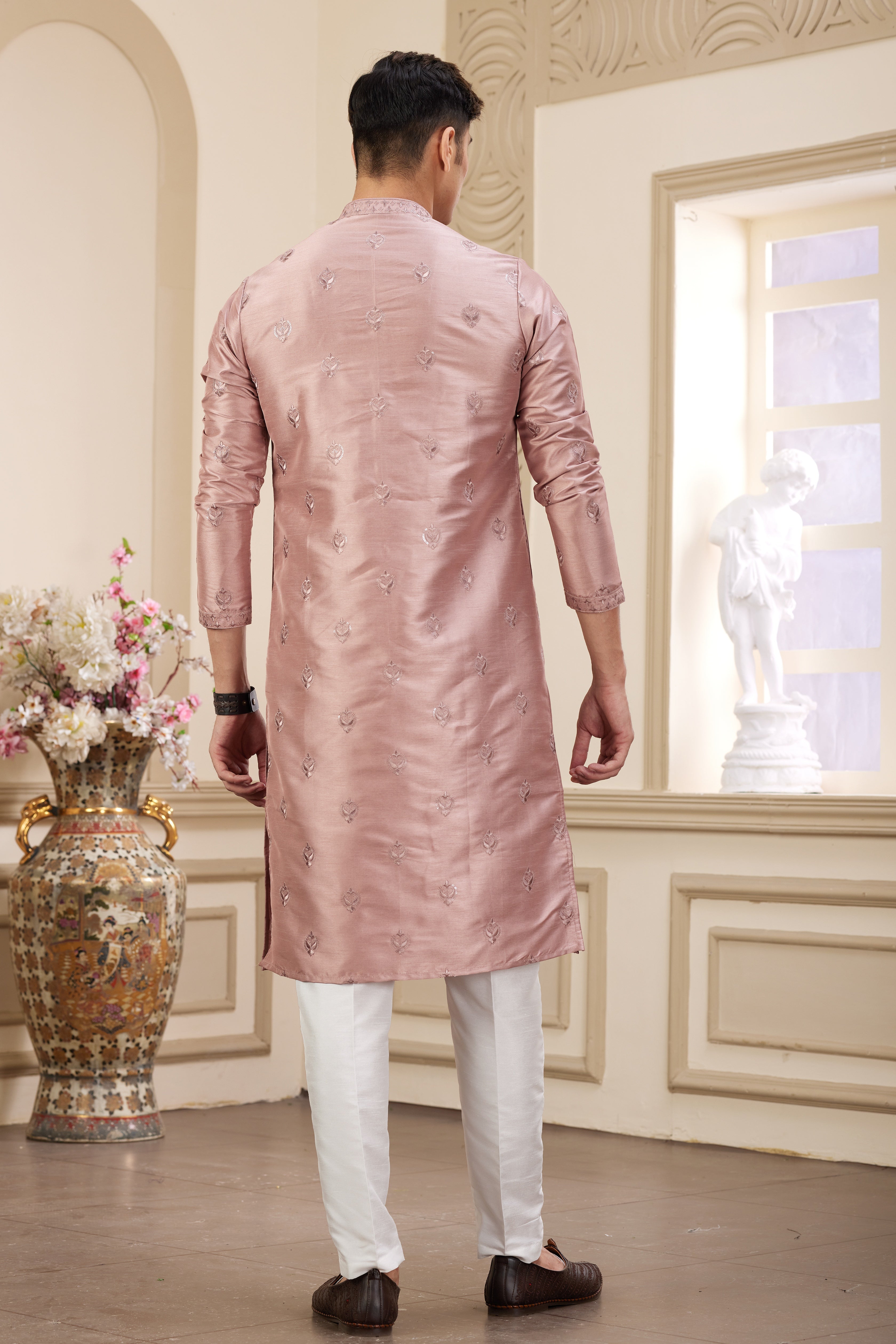 Traditional Indian men’s pink kurta pajama