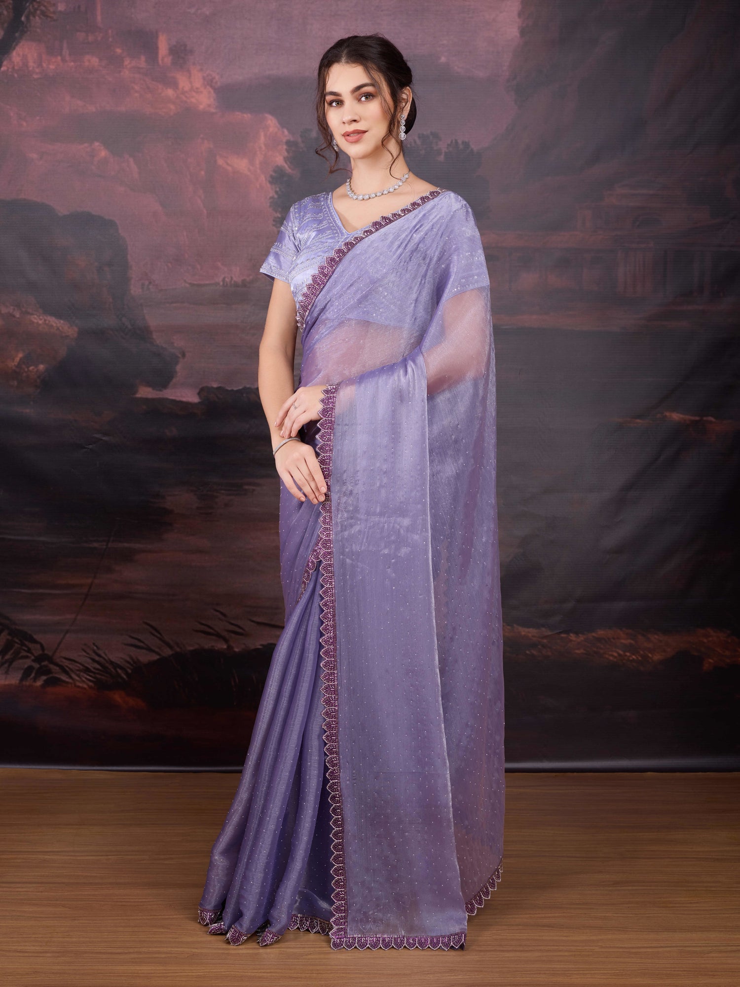 Elegant Jimmy Choo lavender saree with scalloped border