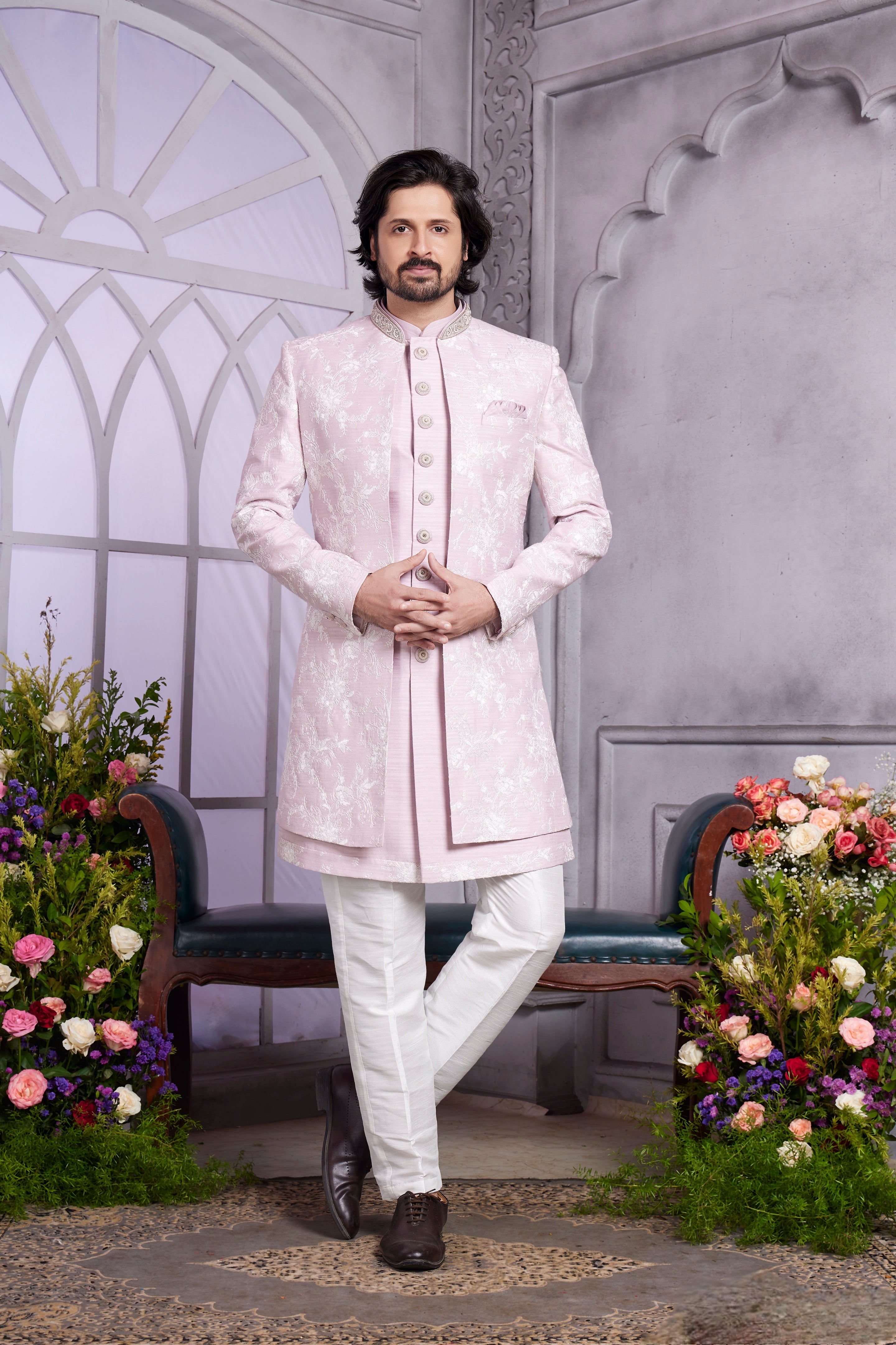 Designer groom wear in light pink