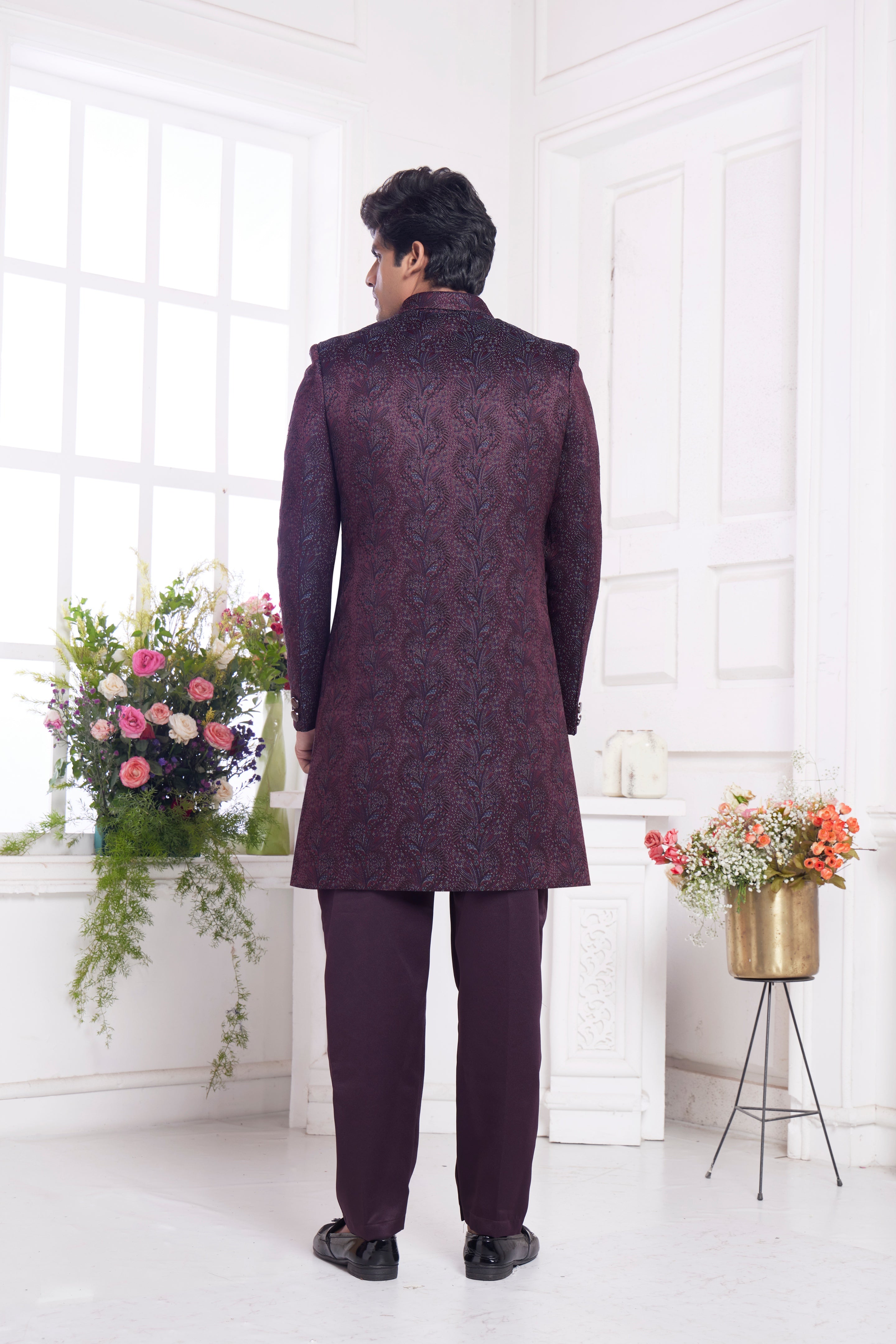 Traditional men’s outfit in maroon silk