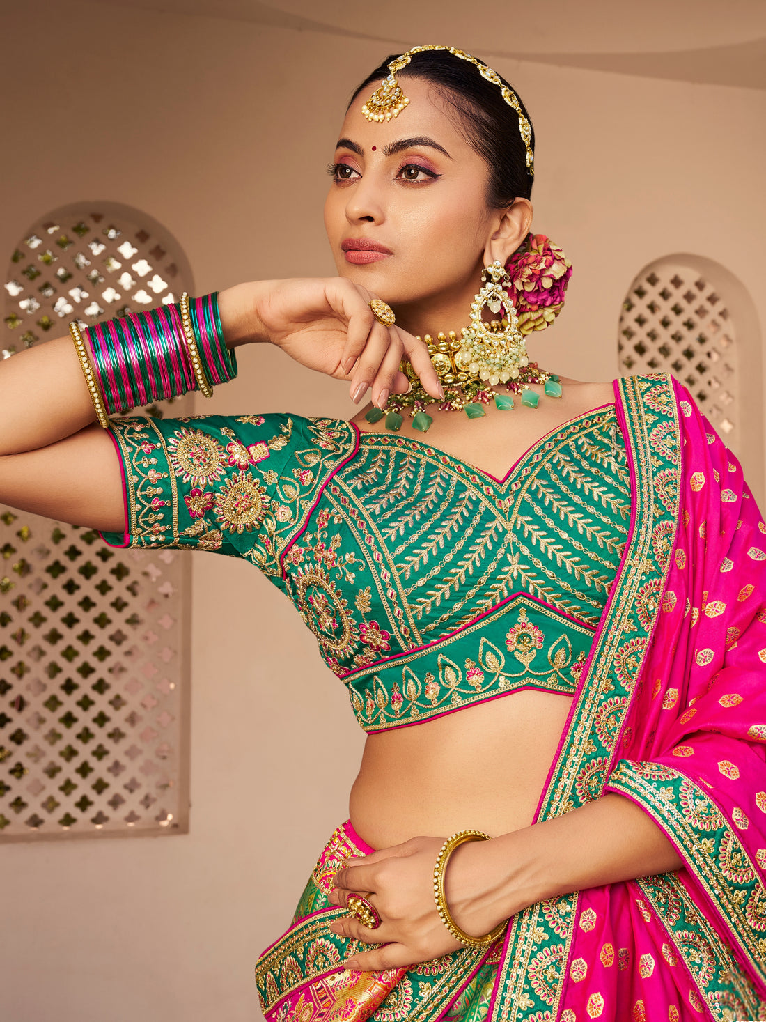 Sea green Banarasi lehenga with pink dupatta

